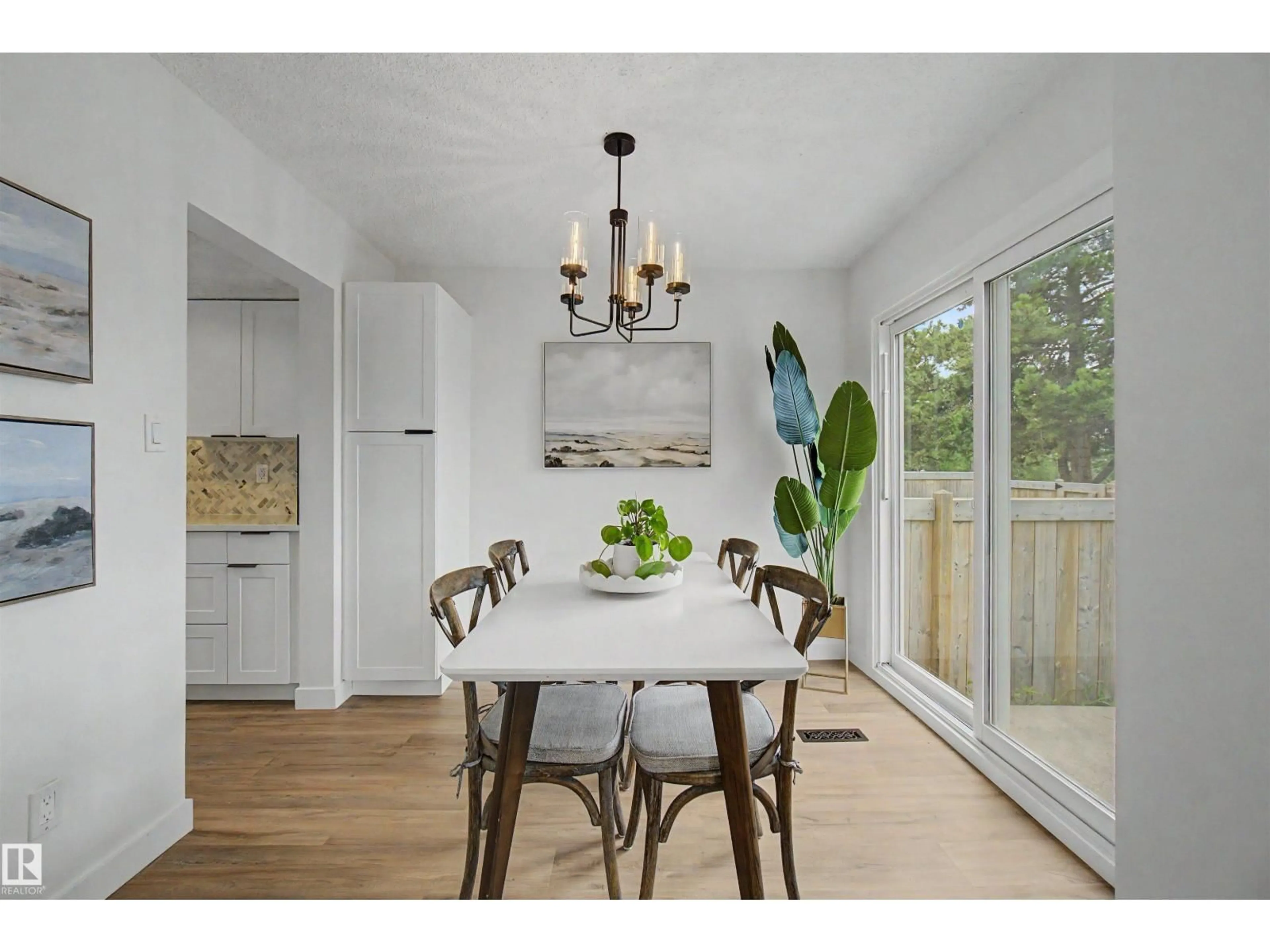 Dining room, wood/laminate floor for 215 GRANDIN VG, St. Albert Alberta T8N2J3
