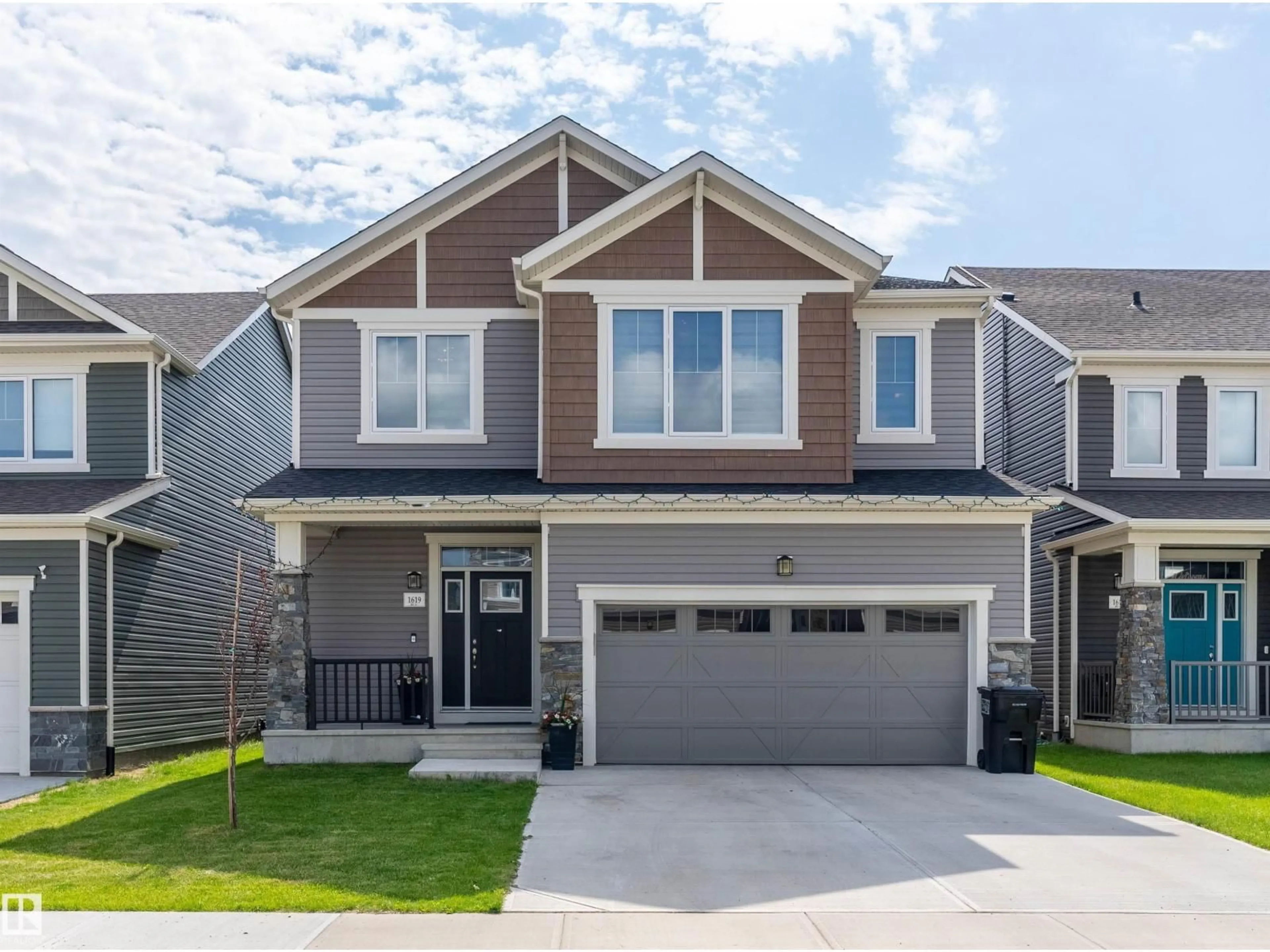 Home with brick exterior material, street for NW - 1619 201 ST, Edmonton Alberta T6M0Y3