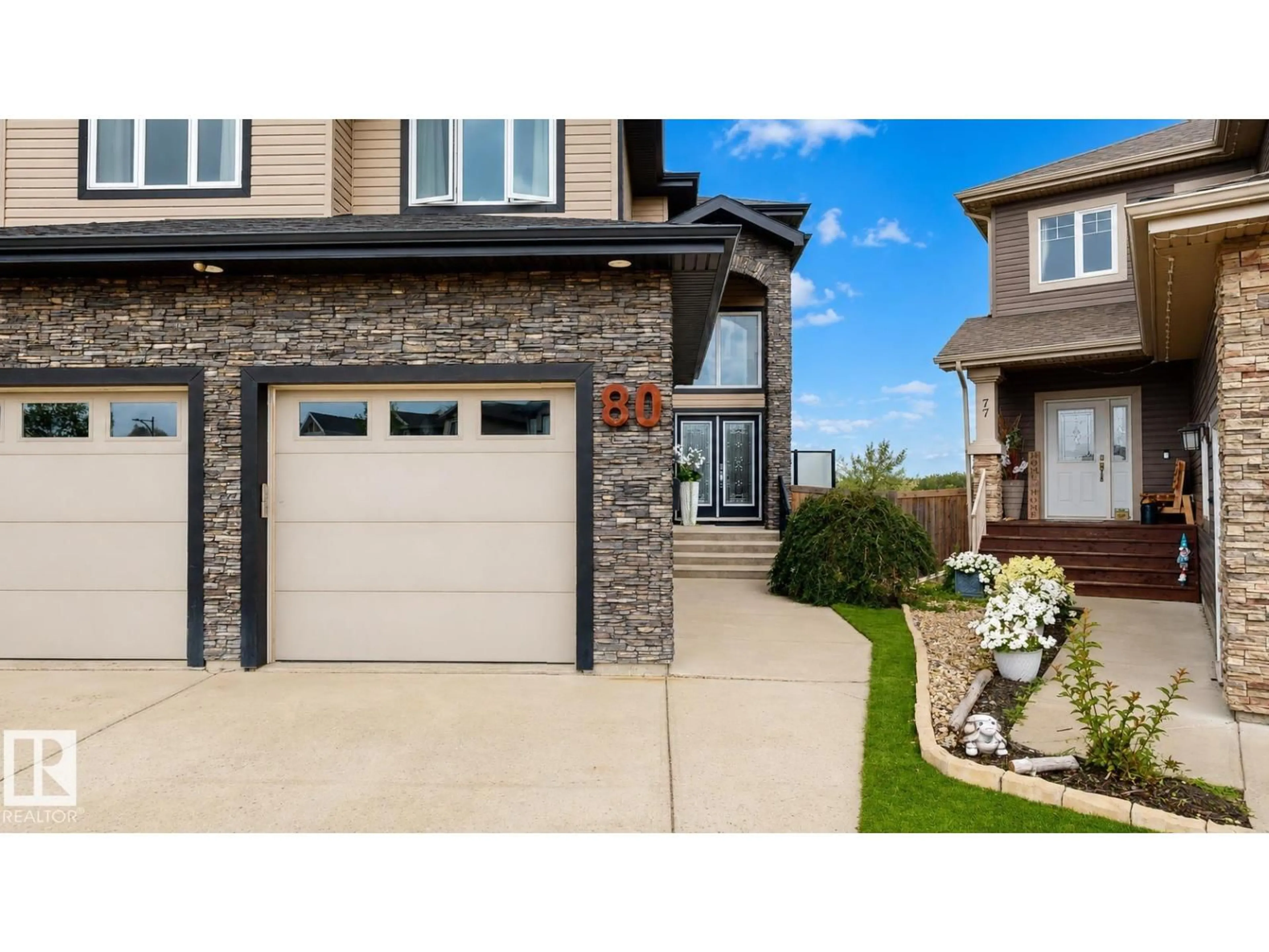 Home with vinyl exterior material, street for 80 ELLISON, Fort Saskatchewan Alberta T8L0M9