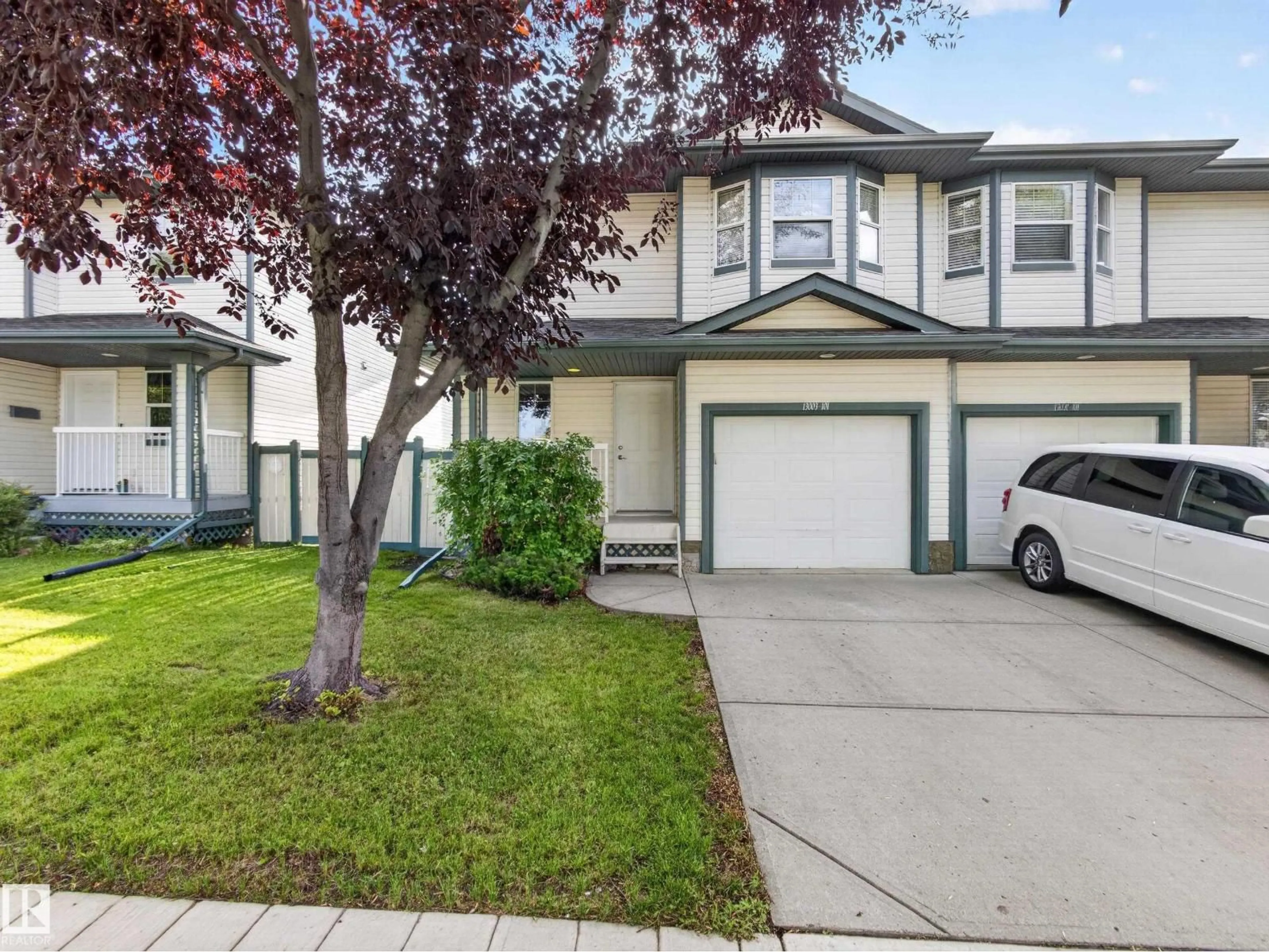 Home with vinyl exterior material, street for NW - 13003 101 ST, Edmonton Alberta T5E4G1