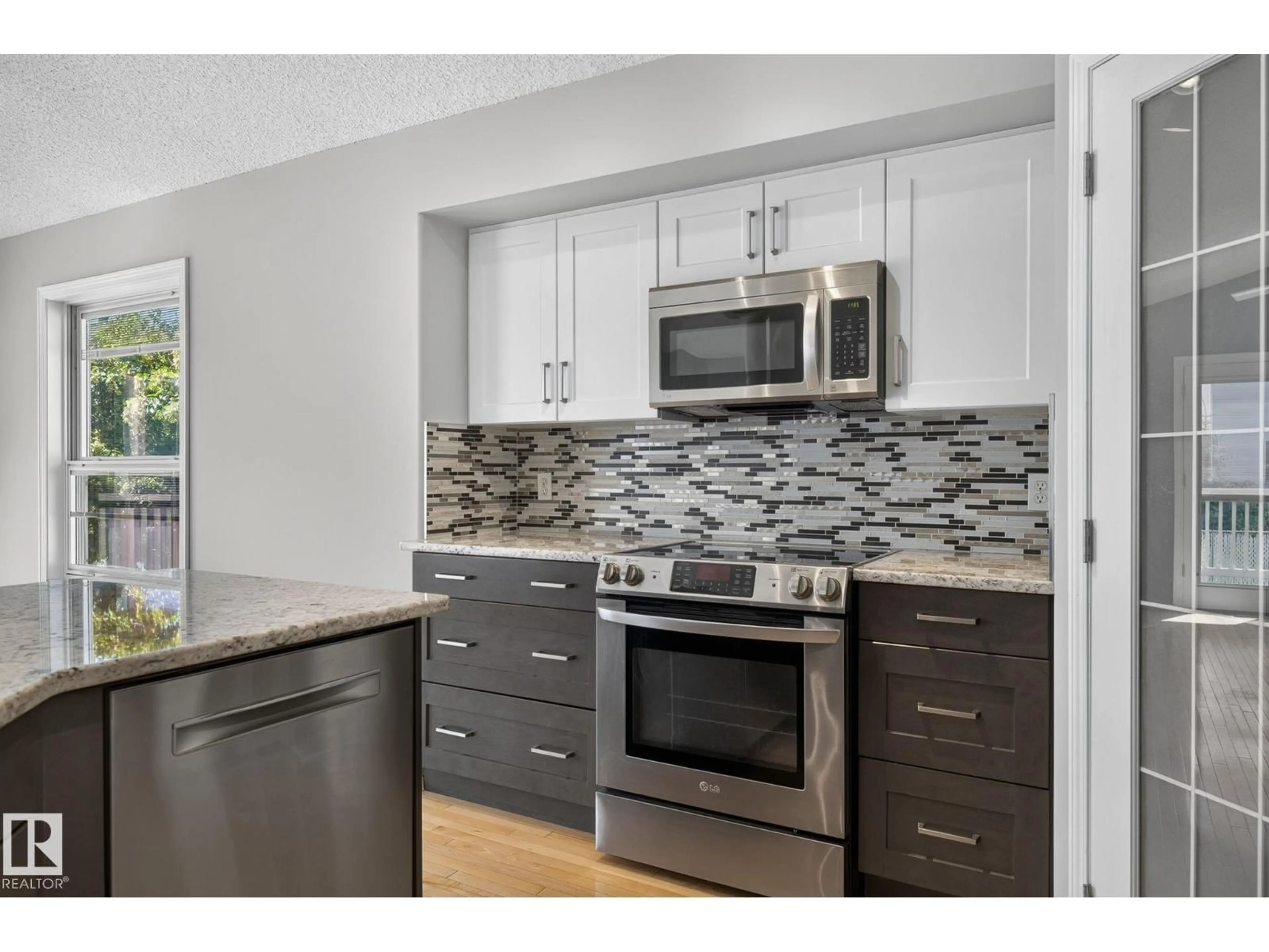 Open concept kitchen, ceramic/tile floor for 227 WYMAN LN, Edmonton Alberta T6T1M9