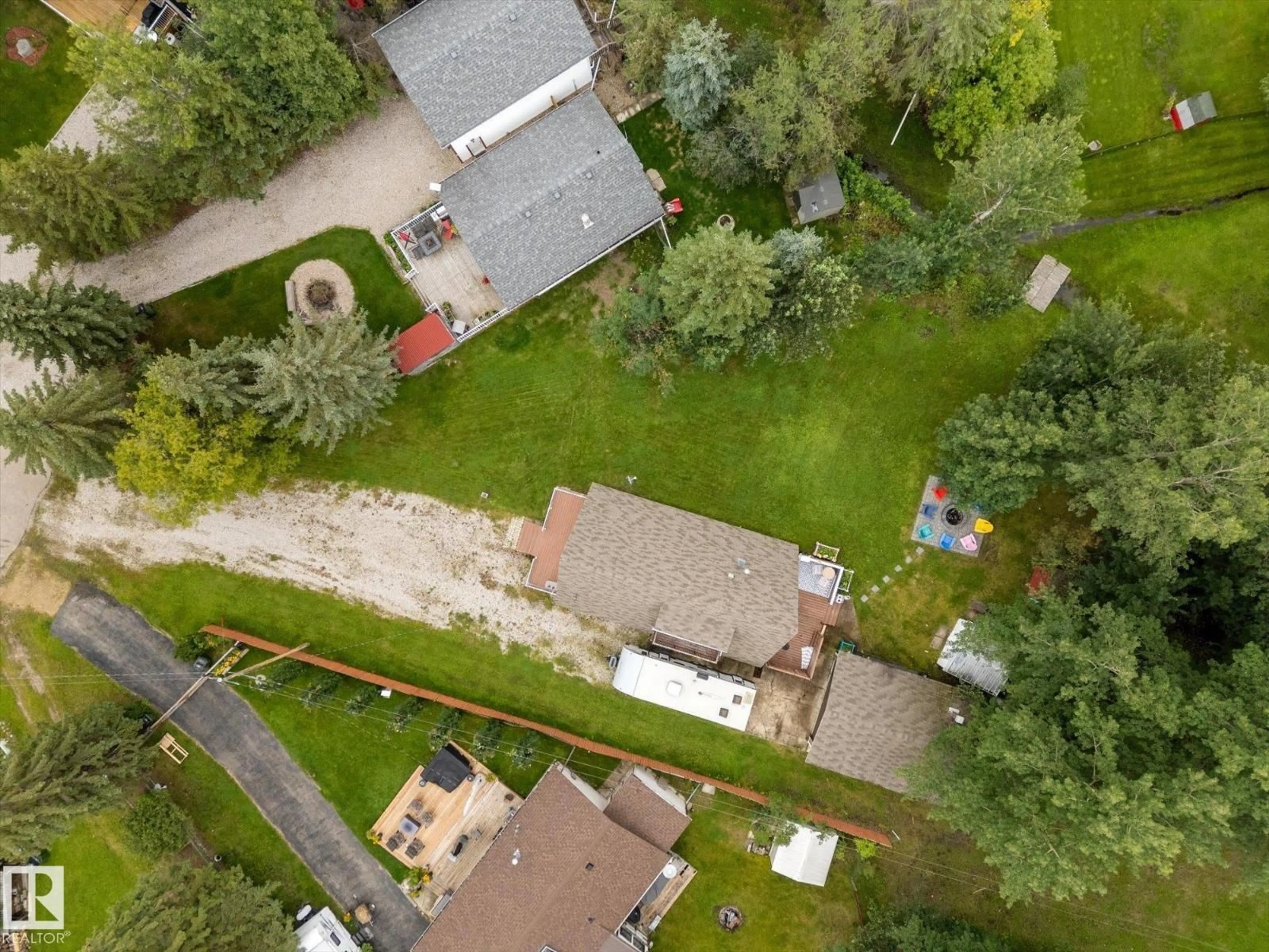 A pic from outside/outdoor area/front of a property/back of a property/a pic from drone, street for 1022 10 ST, Rural Lac Ste. Anne County Alberta T0E0A0