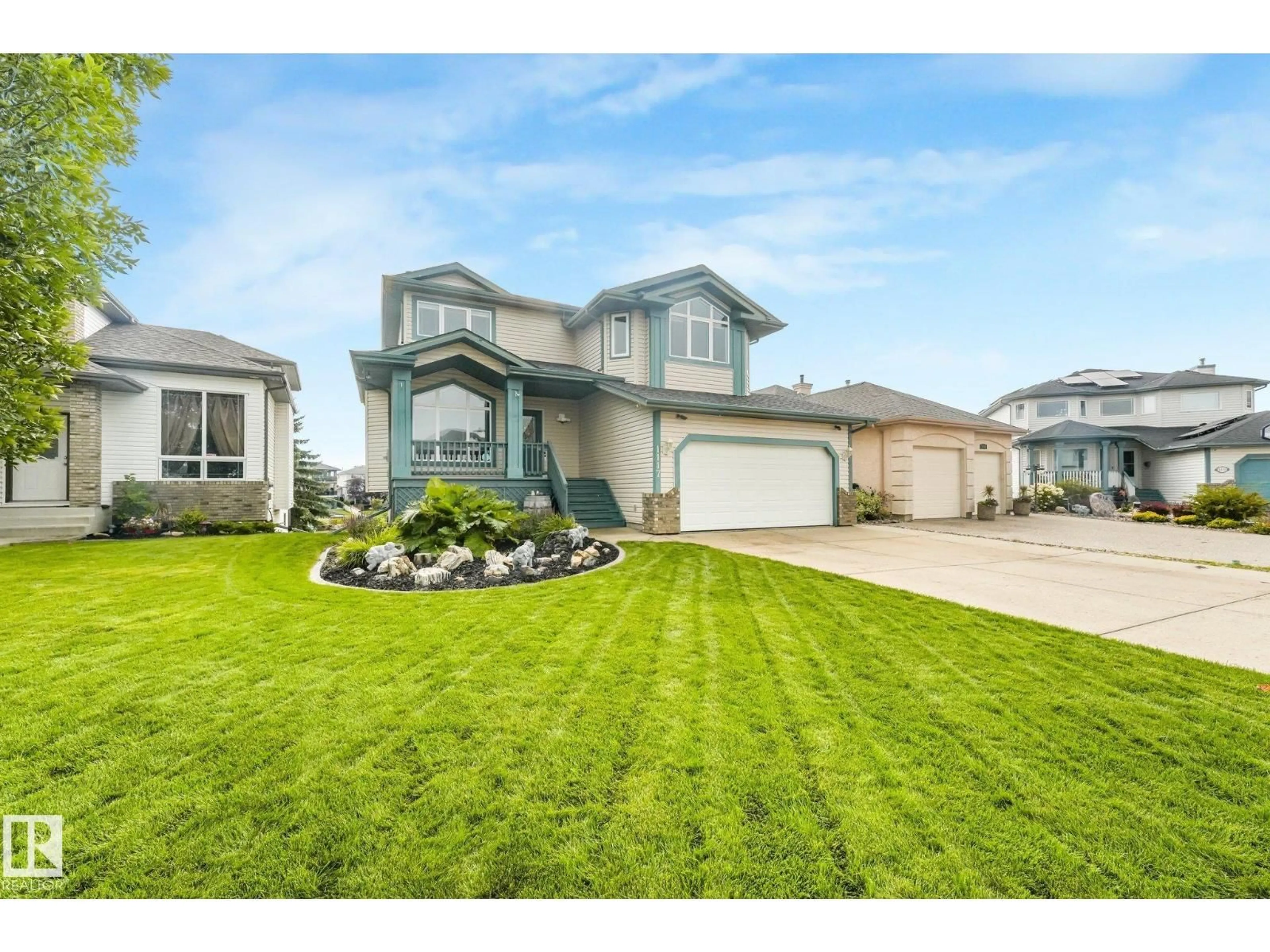 Home with vinyl exterior material, street for 1117 KLARVATTEN COVE CV, Edmonton Alberta T5Z3N3