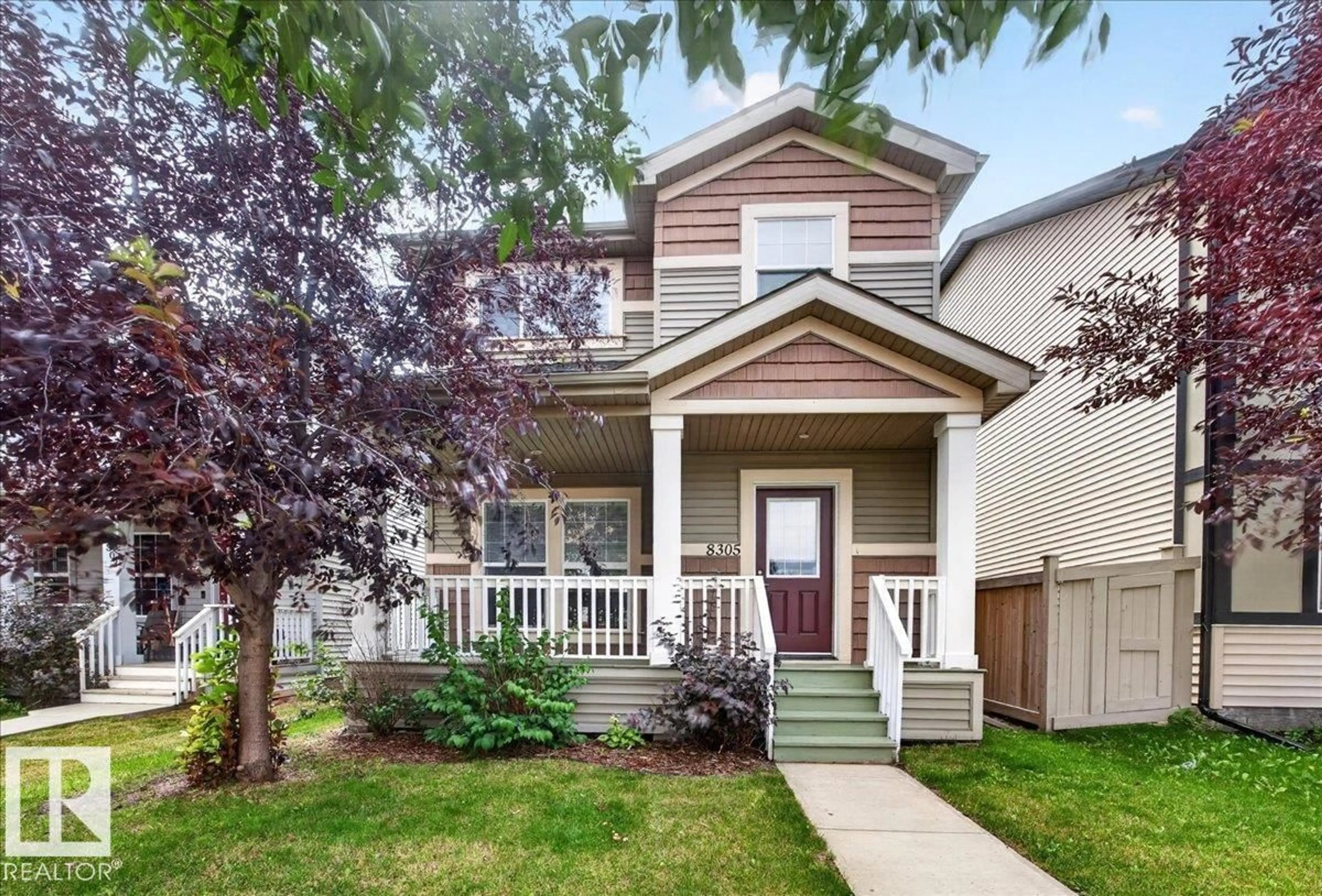 Home with vinyl exterior material, street for 8305 ELLIS CR, Edmonton Alberta T6M2N5