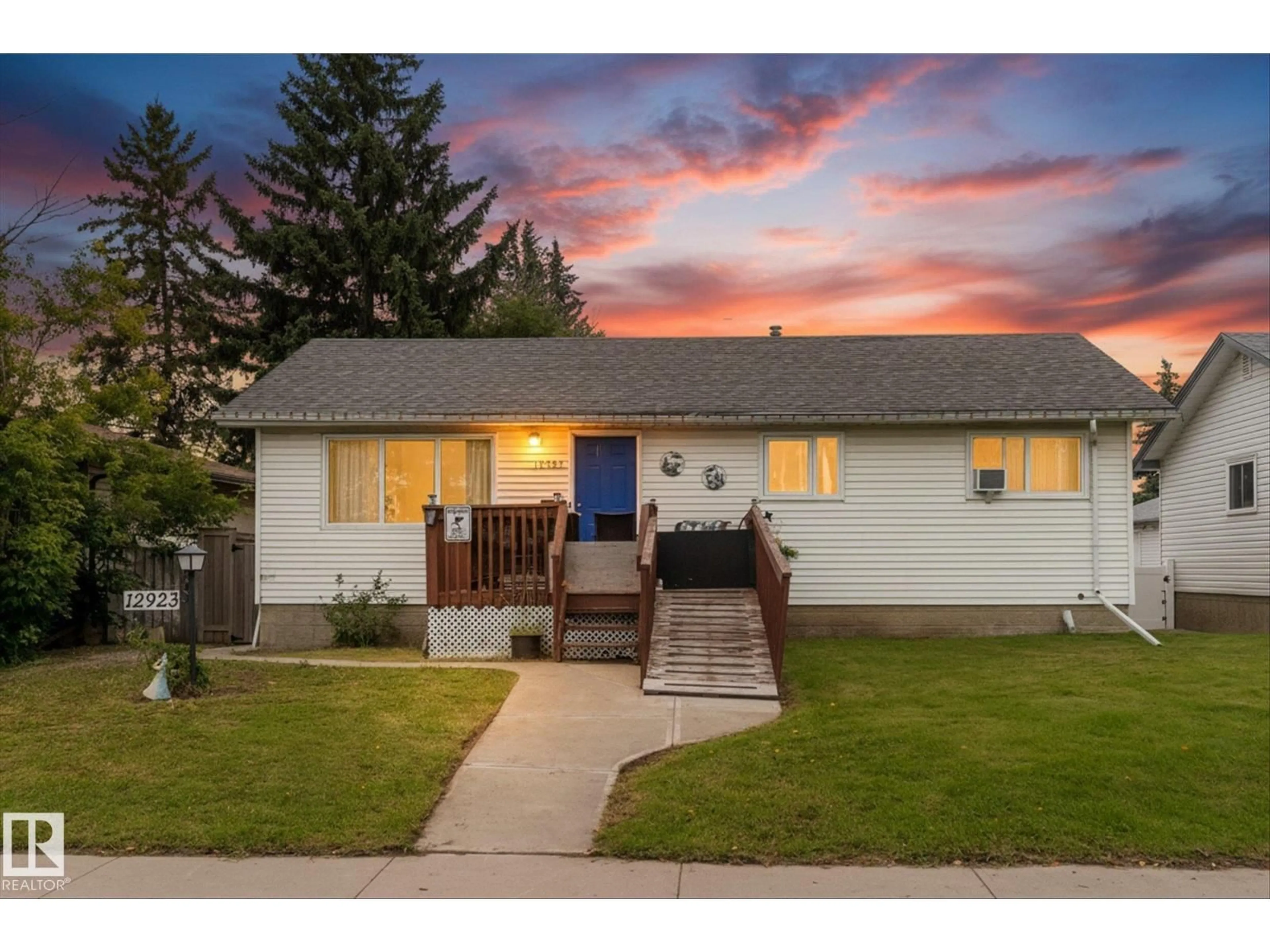 Home with vinyl exterior material, street for NW - 12923 137 AV, Edmonton Alberta T5L4C3