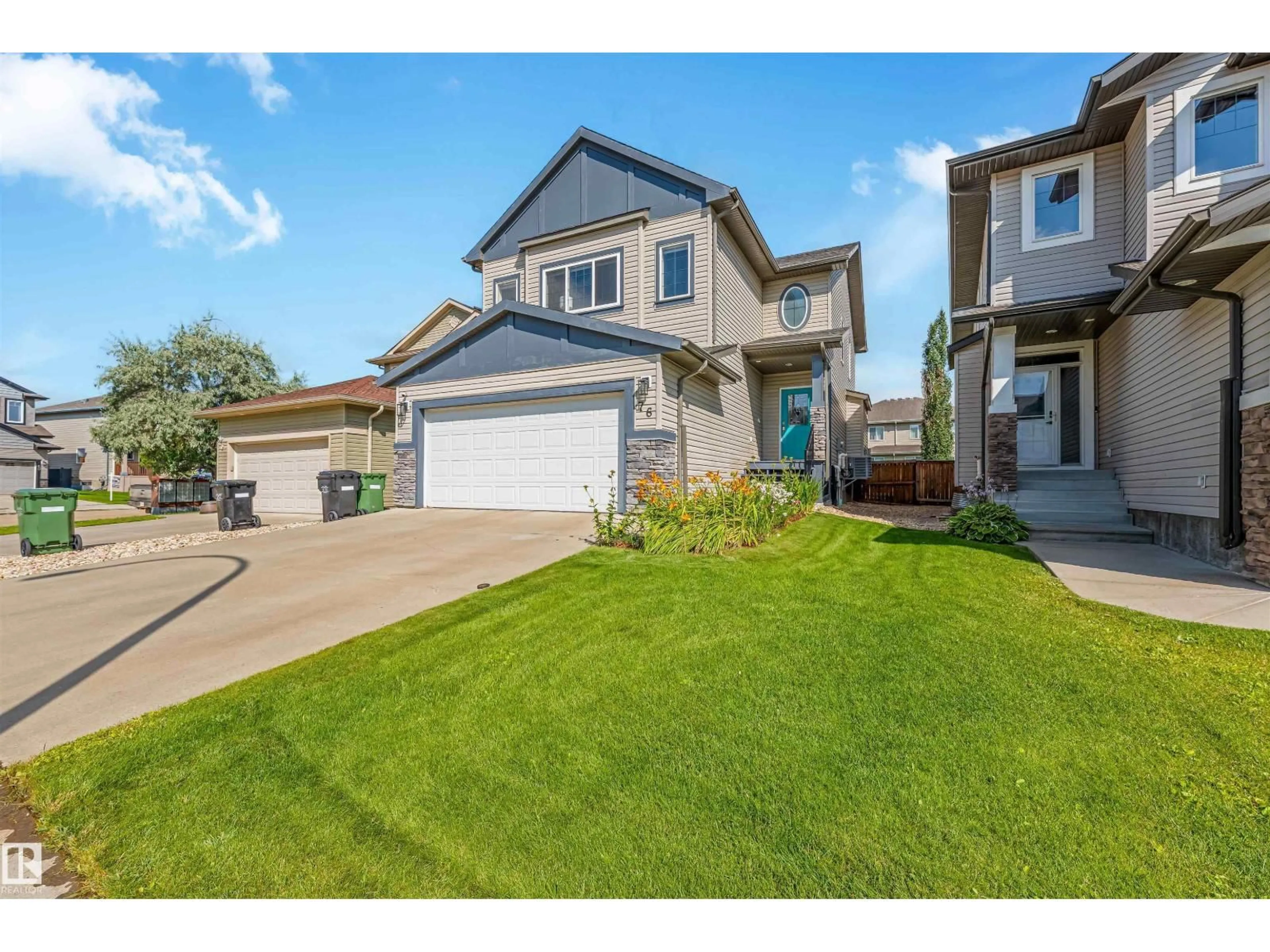 A pic from outside/outdoor area/front of a property/back of a property/a pic from drone, street for 76 DUNLOP WD, Leduc Alberta T9E0J7