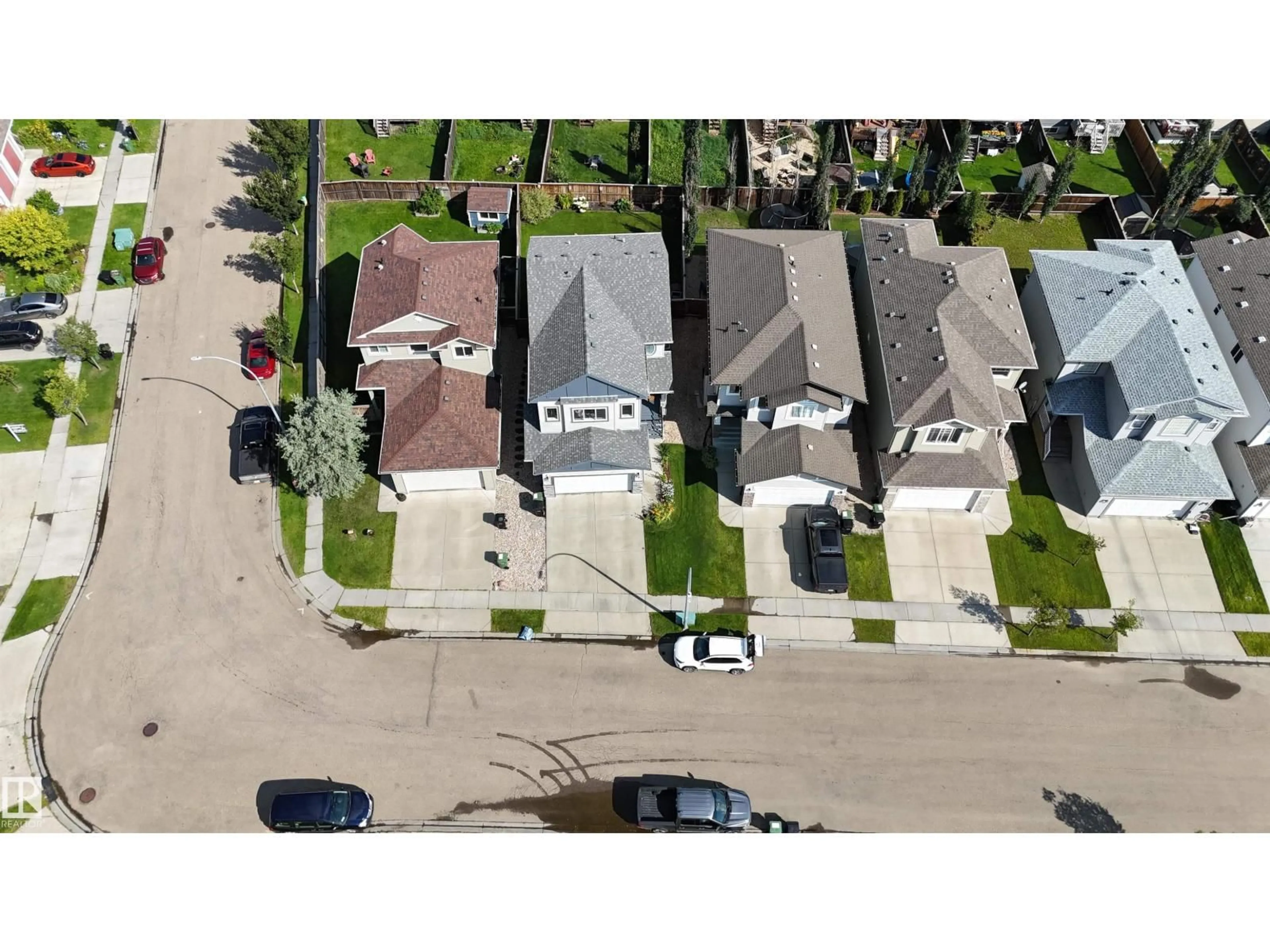 A pic from outside/outdoor area/front of a property/back of a property/a pic from drone, street for 76 DUNLOP WD, Leduc Alberta T9E0J7