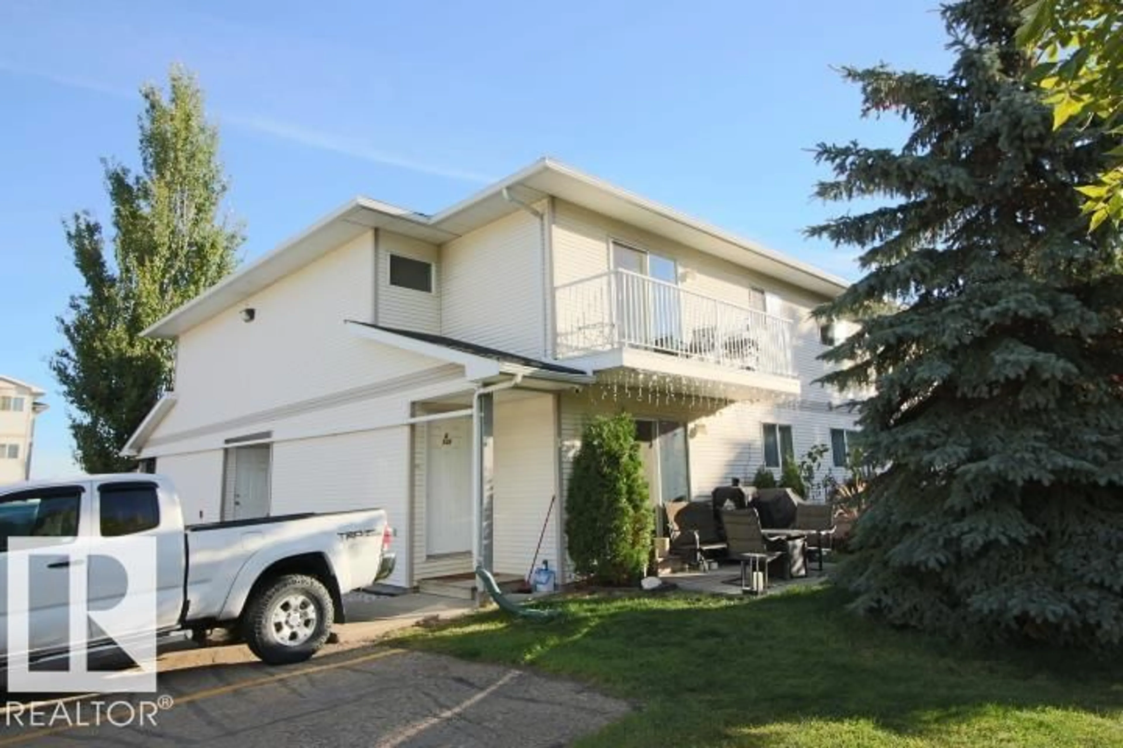 Home with vinyl exterior material, street for #108D - 122 WESTPARK DR, Fort Saskatchewan Alberta T8L4M2