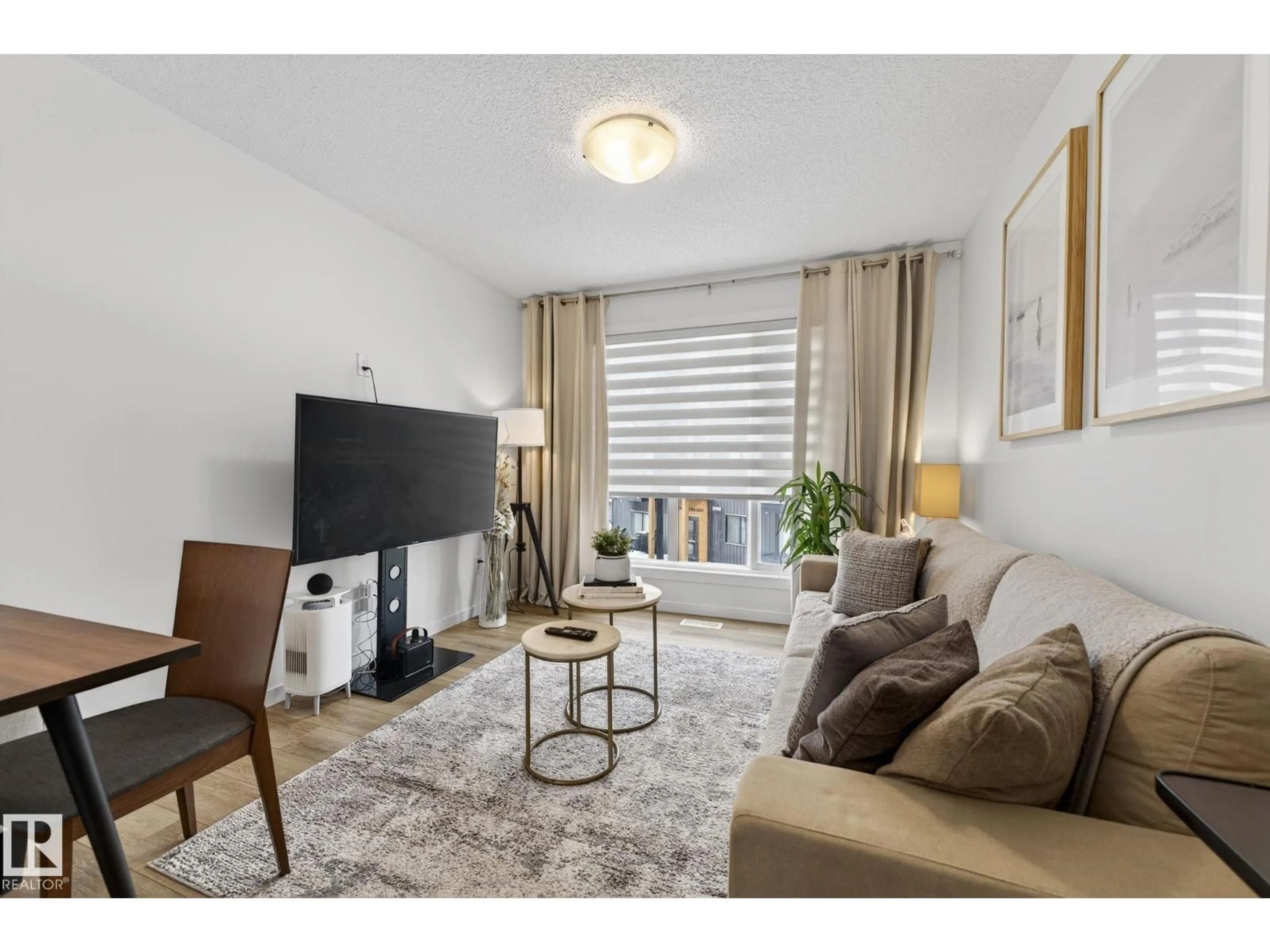 Living room with furniture, unknown for 850 - 46 SECORD BV, Edmonton Alberta T5T7R9