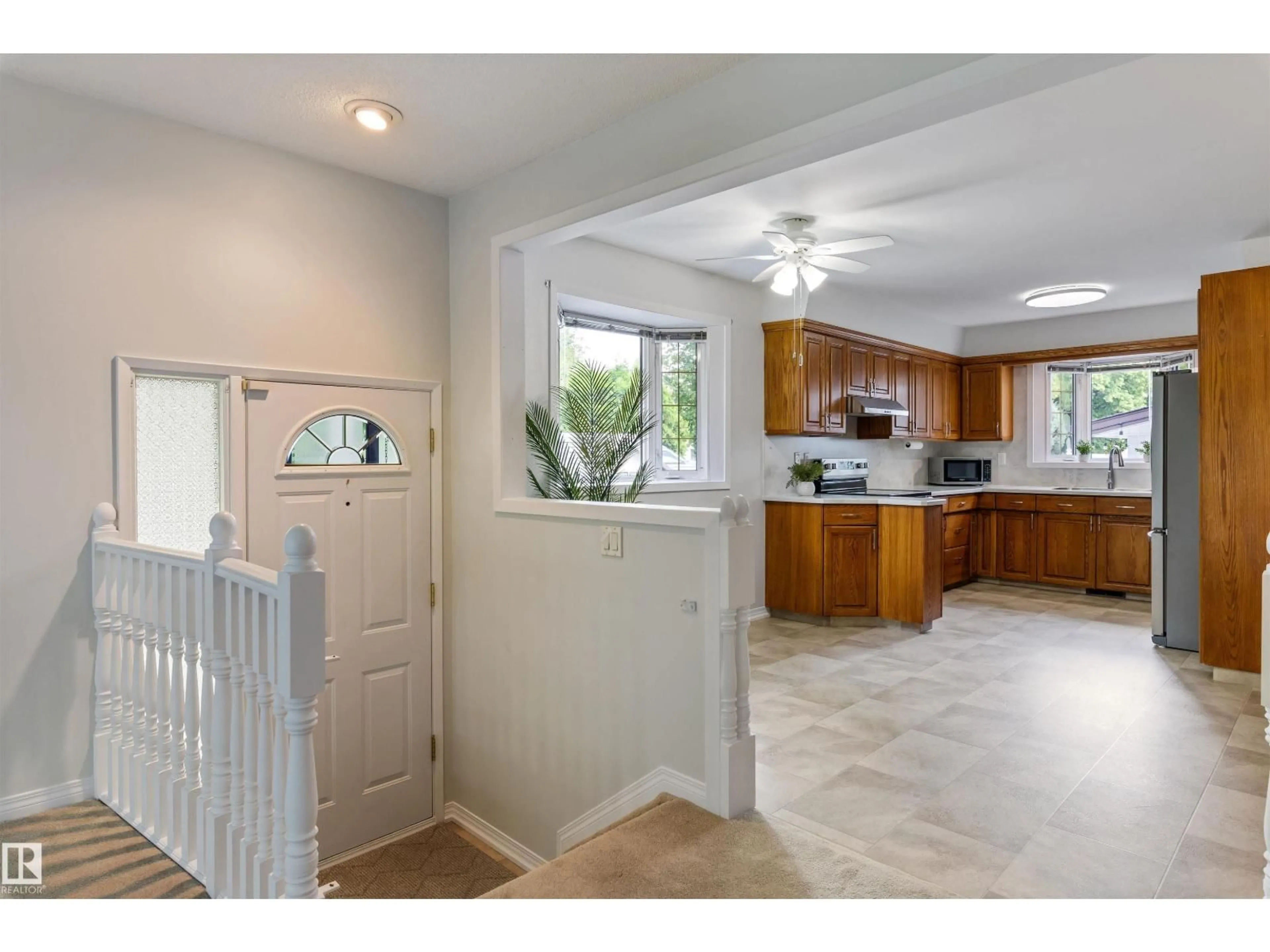 Open concept kitchen, ceramic/tile floor for NW - 11217 38 ST, Edmonton Alberta T5W2G3