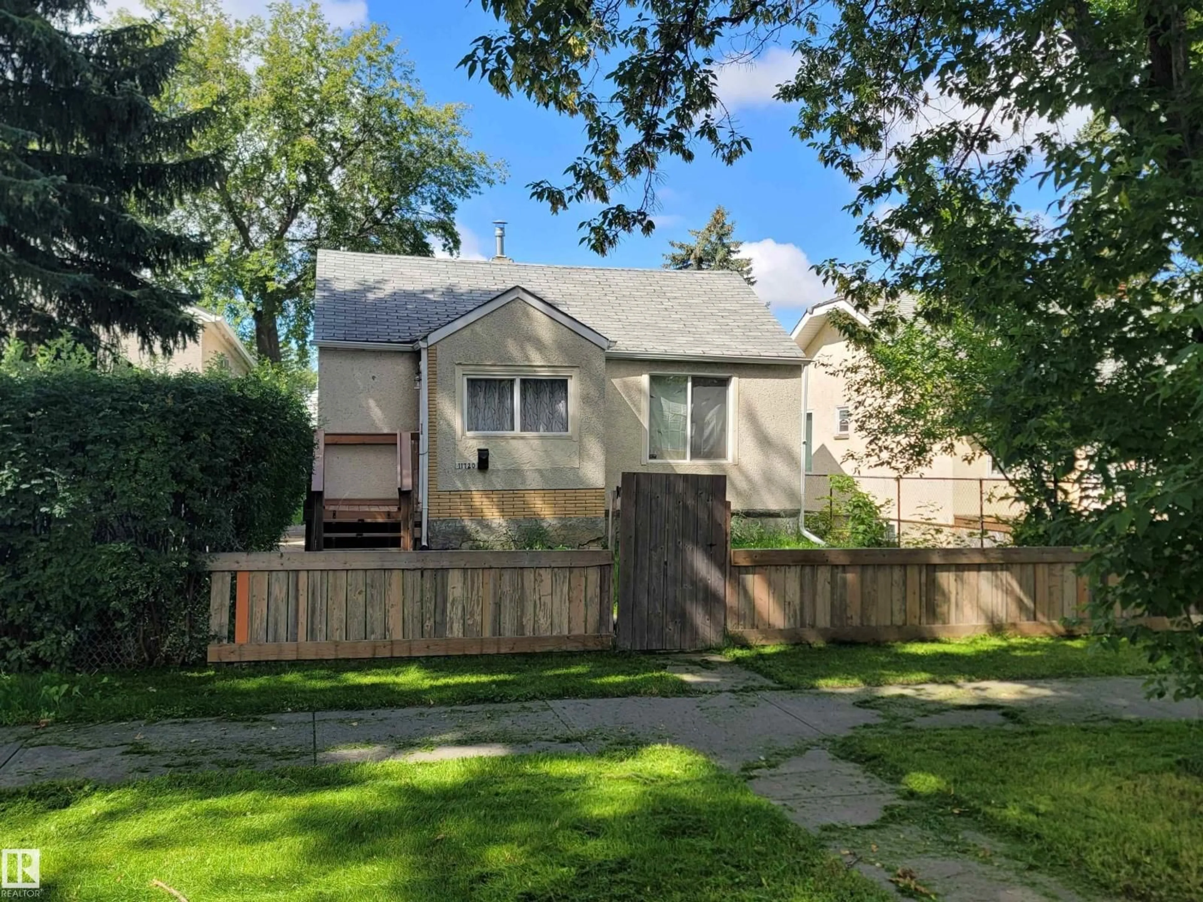 A pic from outside/outdoor area/front of a property/back of a property/a pic from drone, street for 11720 87 ST, Edmonton Alberta T5B3M7