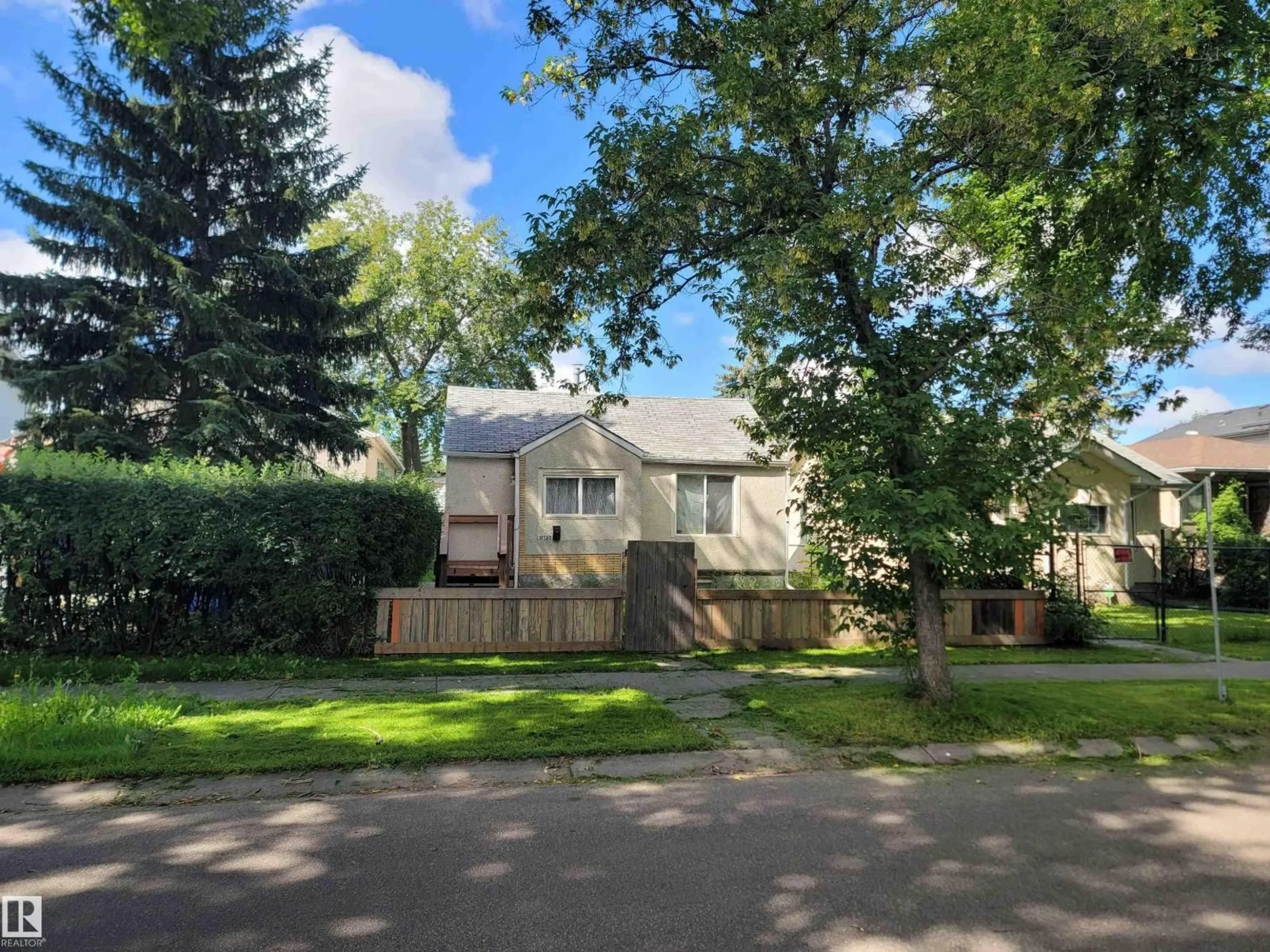 A pic from outside/outdoor area/front of a property/back of a property/a pic from drone, street for 11720 87 ST, Edmonton Alberta T5B3M7