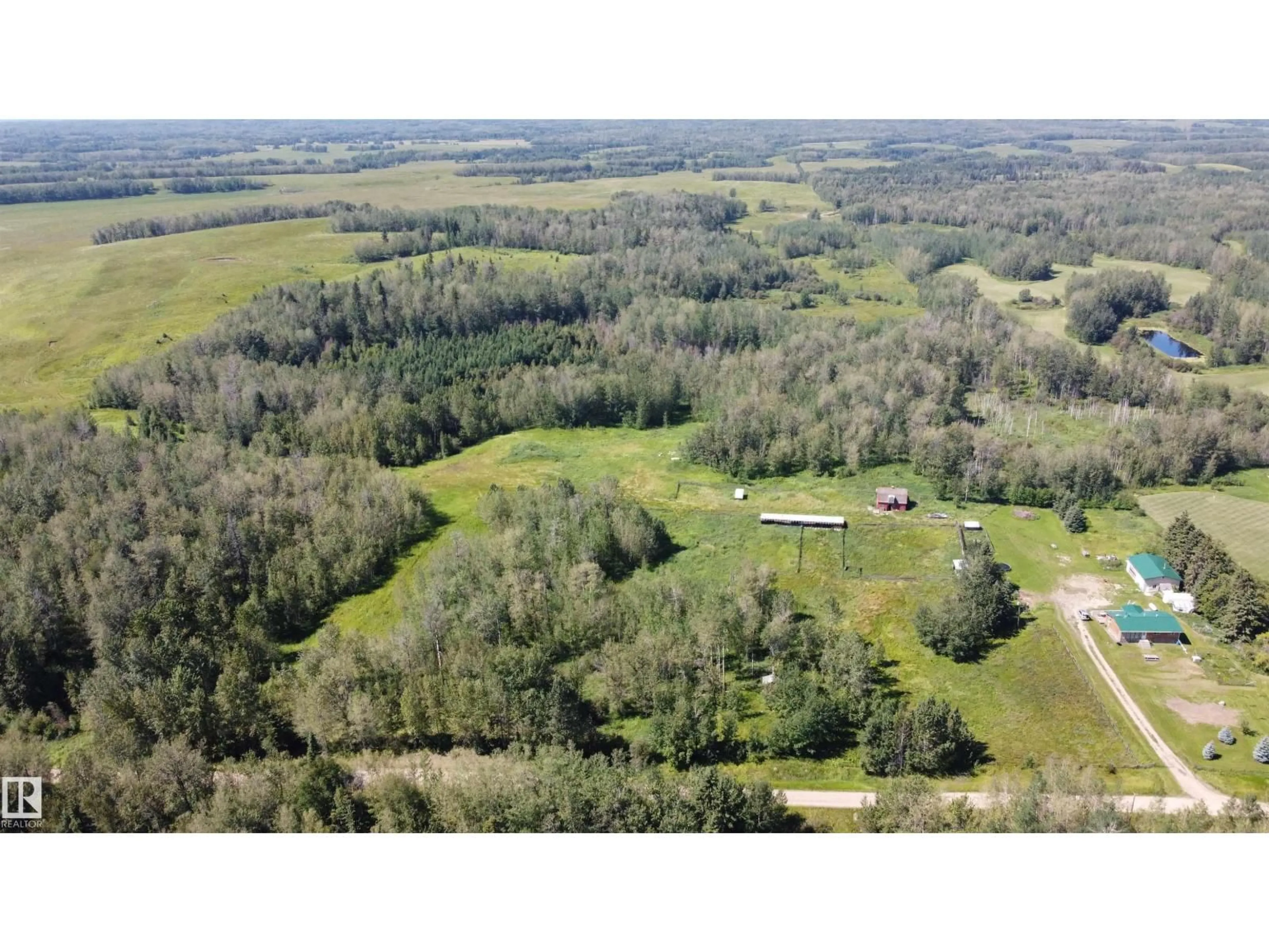 A pic from outside/outdoor area/front of a property/back of a property/a pic from drone, forest/trees view for 49480 RGE RD 41, Rural Leduc County Alberta T0C2T0