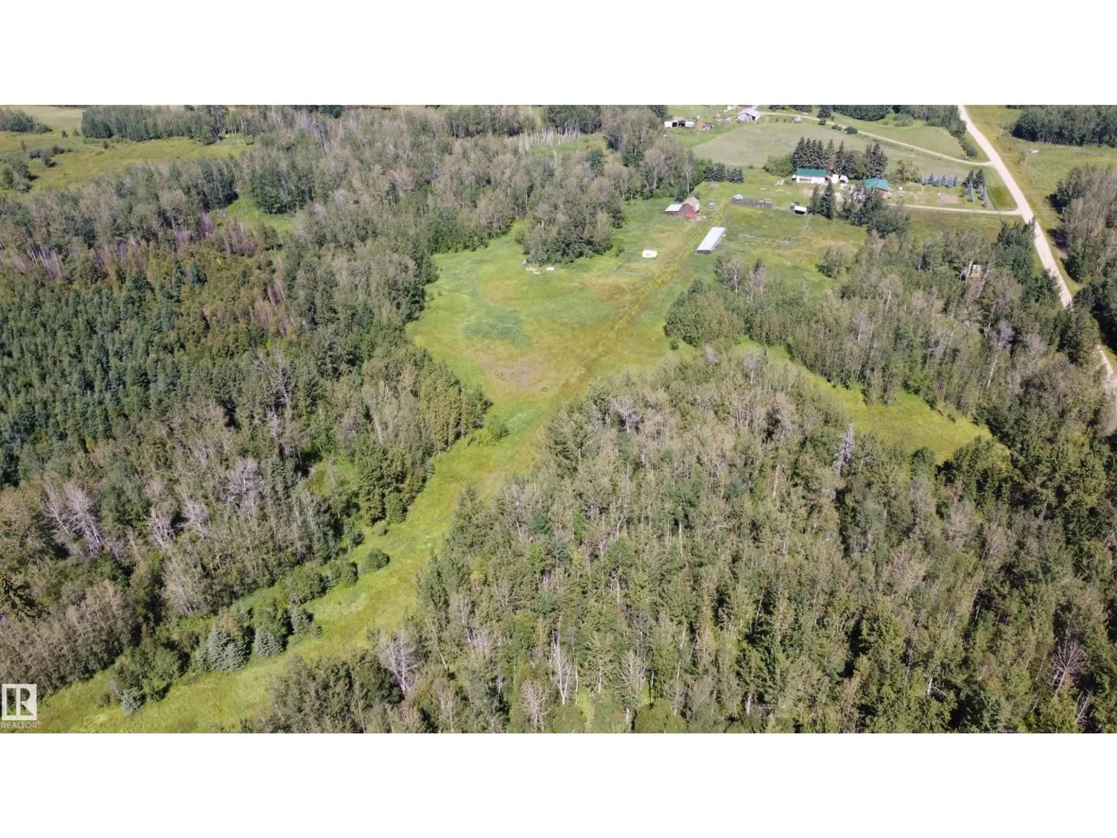 A pic from outside/outdoor area/front of a property/back of a property/a pic from drone, forest/trees view for 49480 RGE RD 41, Rural Leduc County Alberta T0C2T0