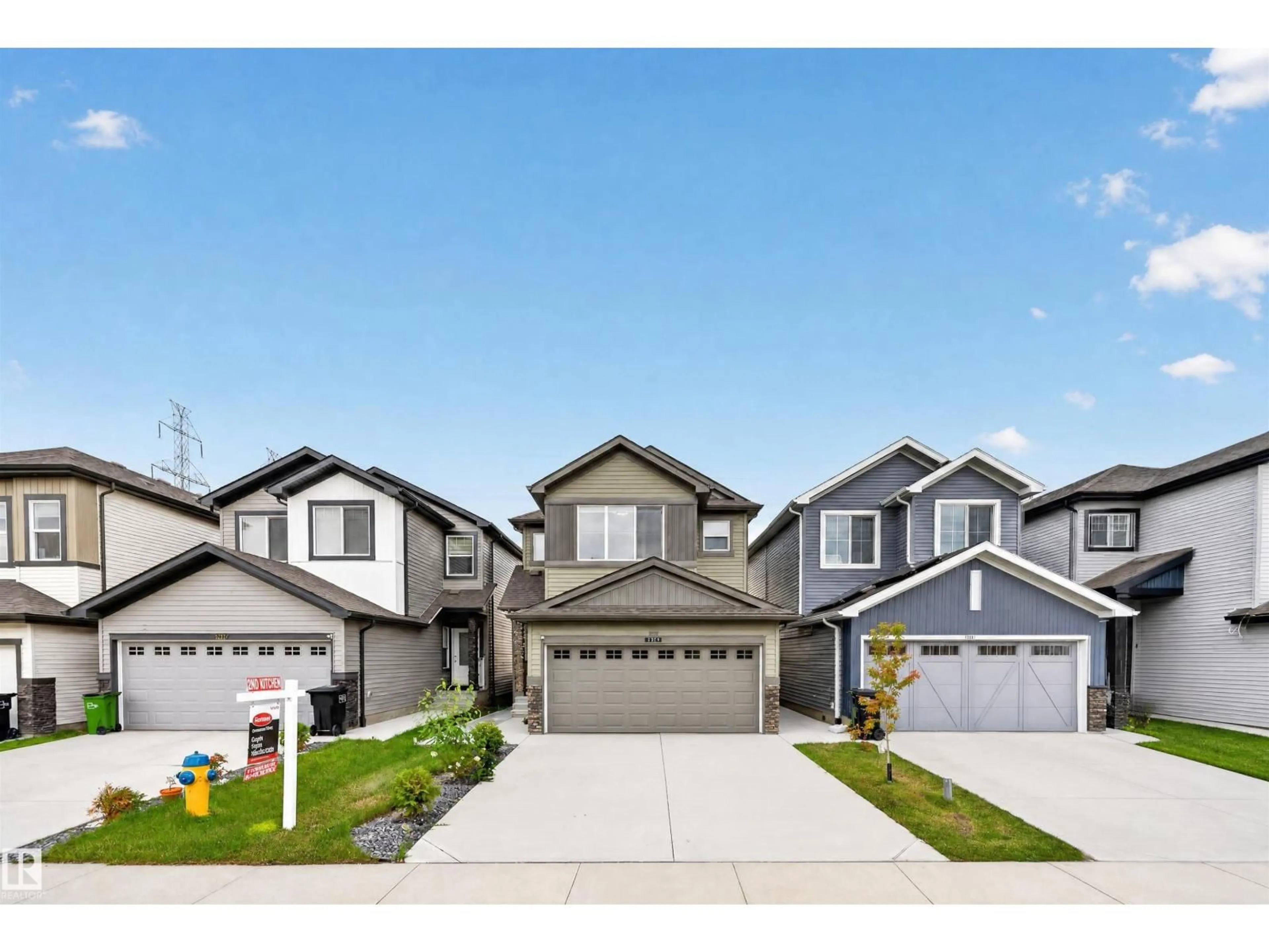 Home with vinyl exterior material, street for NW - 1676 27 ST, Edmonton Alberta T6T2T8