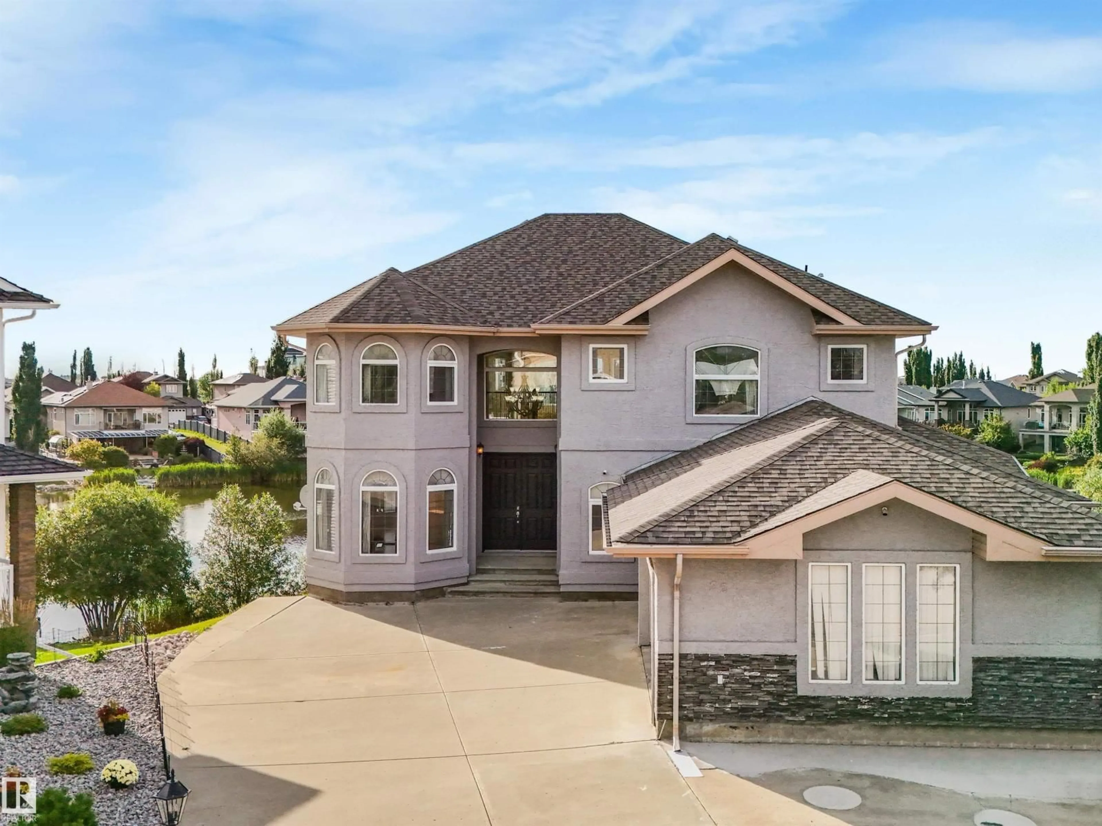 A pic from outside/outdoor area/front of a property/back of a property/a pic from drone, unknown for 22 SHORES DR, Leduc Alberta T9E8N8