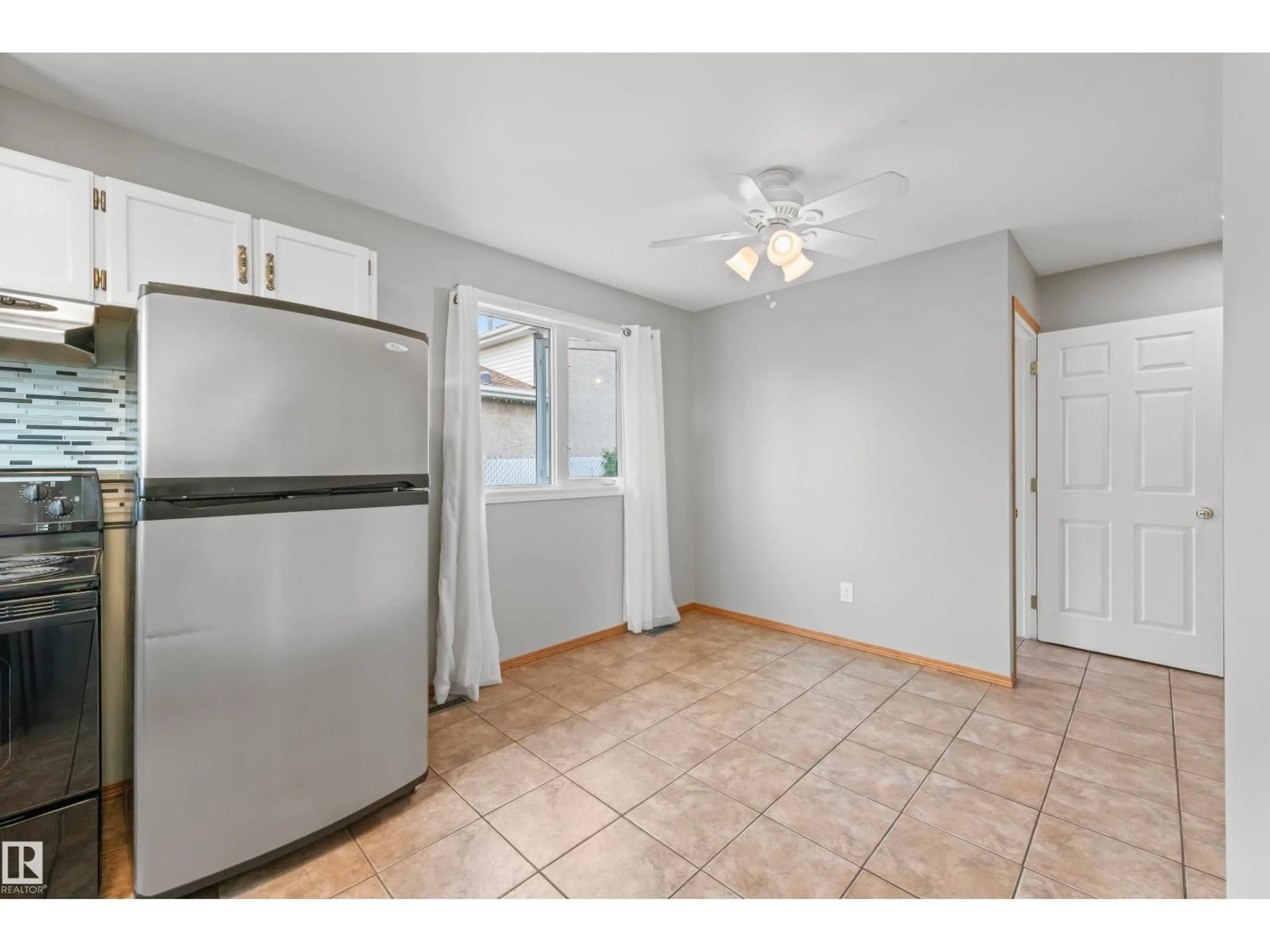 Standard kitchen, ceramic/tile floor for 14538 37 ST, Edmonton Alberta T5Y2K2