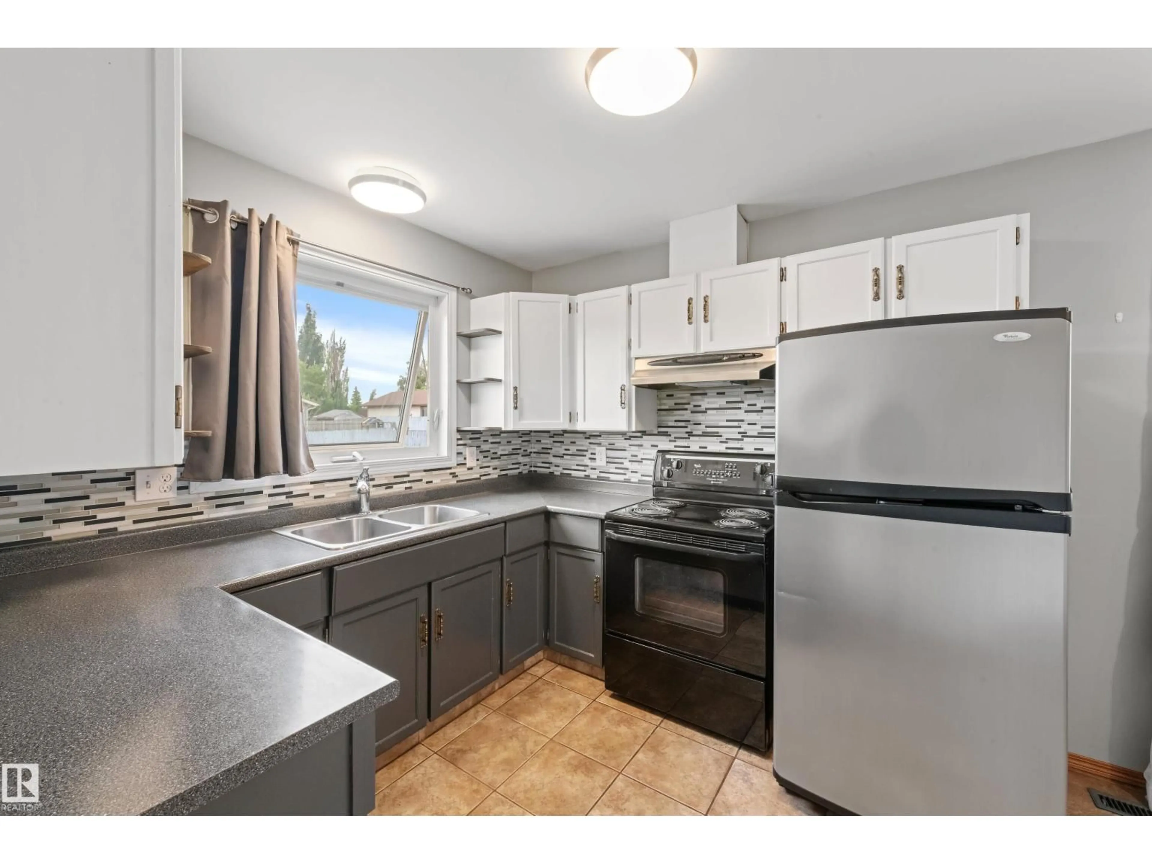 Standard kitchen, ceramic/tile floor for 14538 37 ST, Edmonton Alberta T5Y2K2