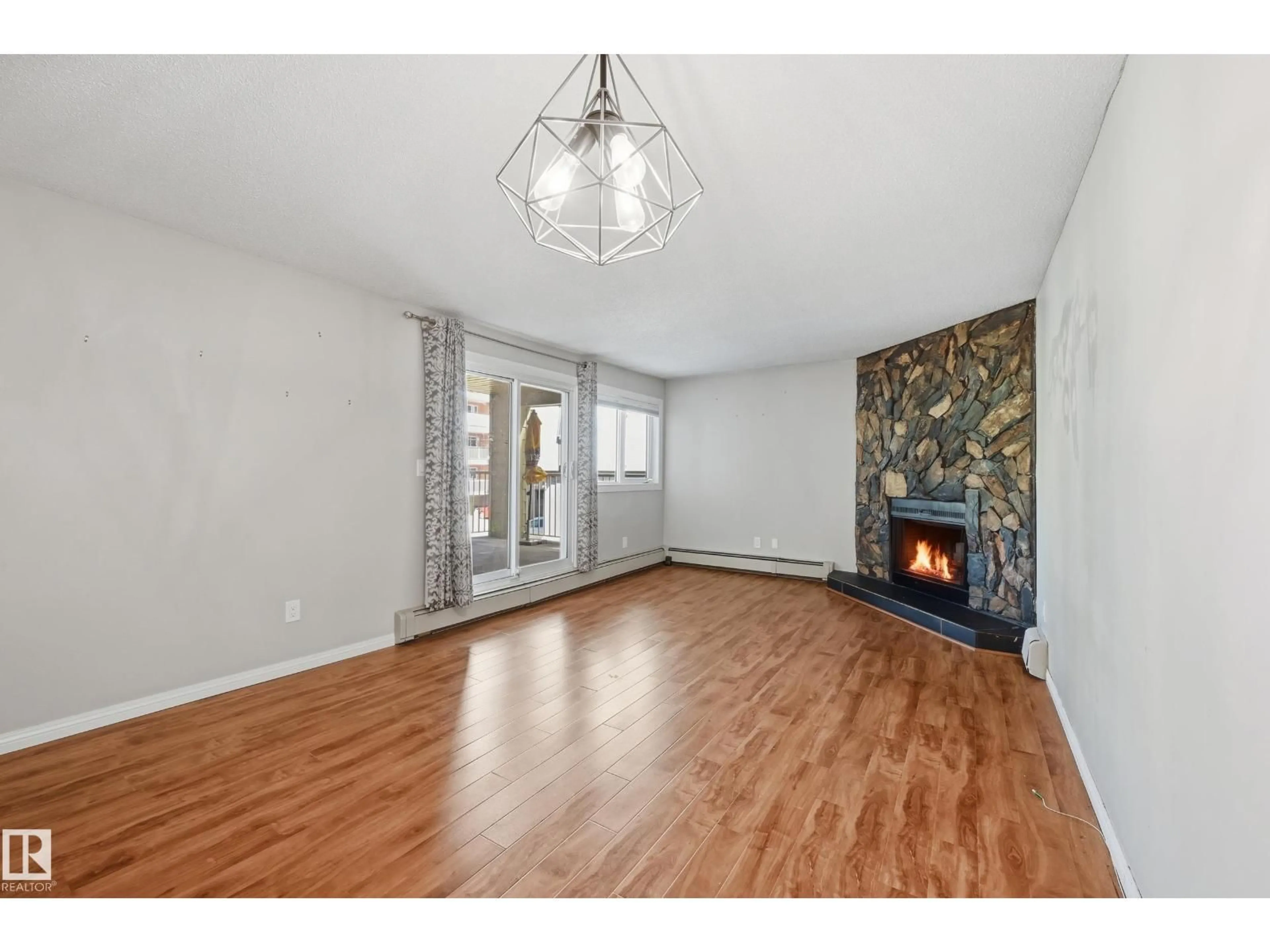 A pic of a room for #107 - 10138 116 ST, Edmonton Alberta T5K1V8