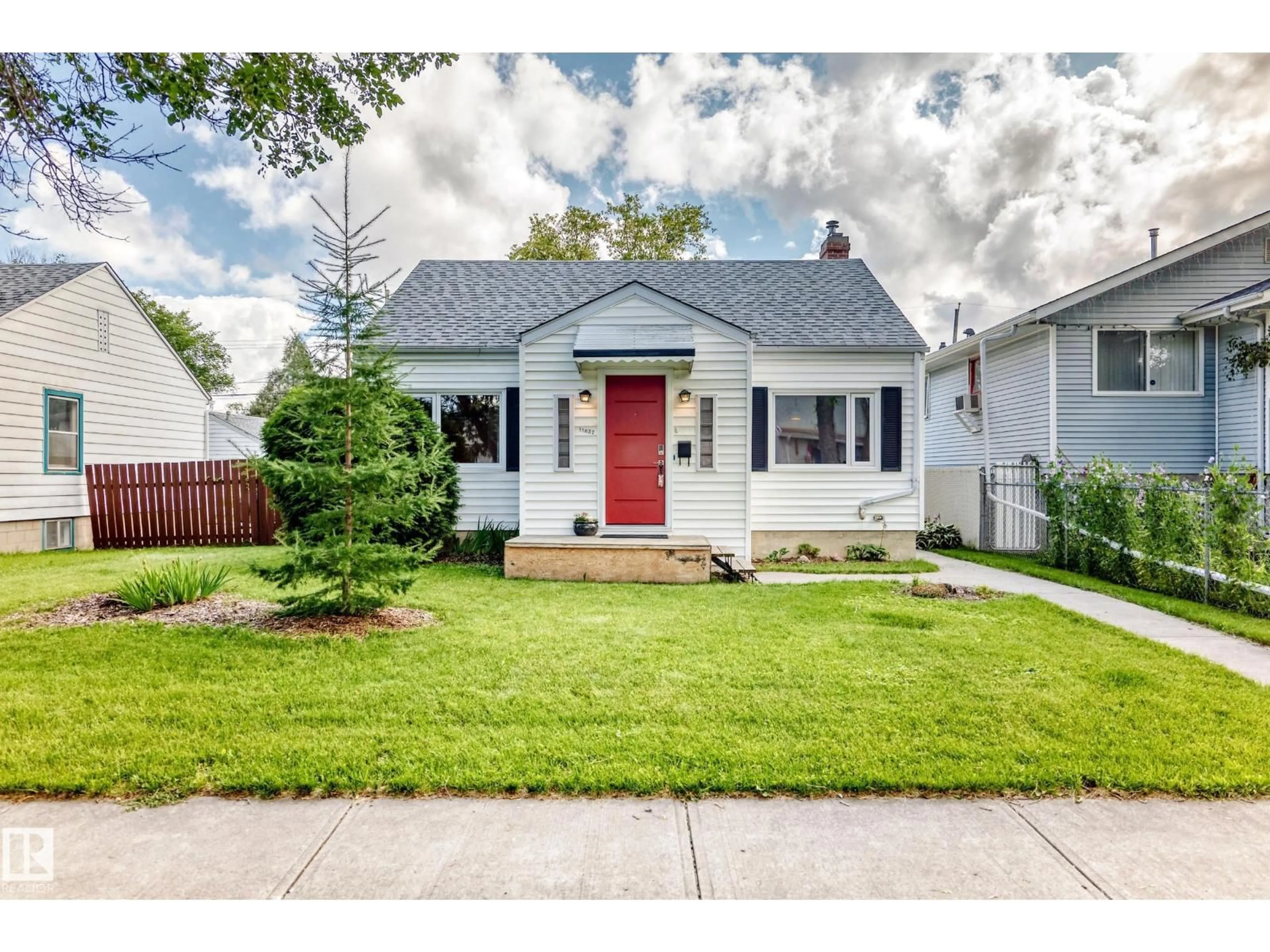 Home with vinyl exterior material, street for NW - 11637 87 ST, Edmonton Alberta T5B3M6
