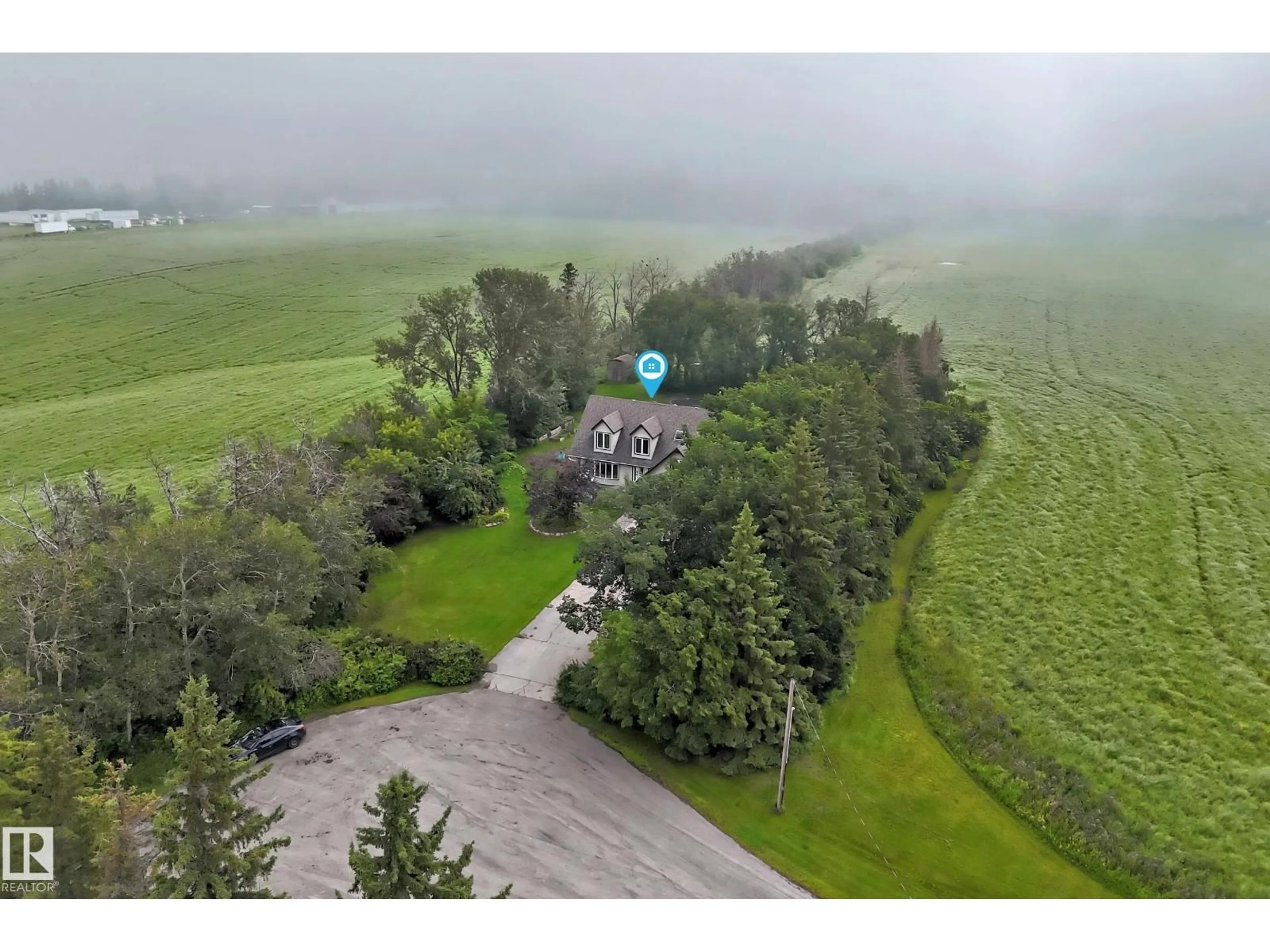 A pic from outside/outdoor area/front of a property/back of a property/a pic from drone, unknown for 38 24512 STURGEON RD, Rural Sturgeon County Alberta T8T0B3