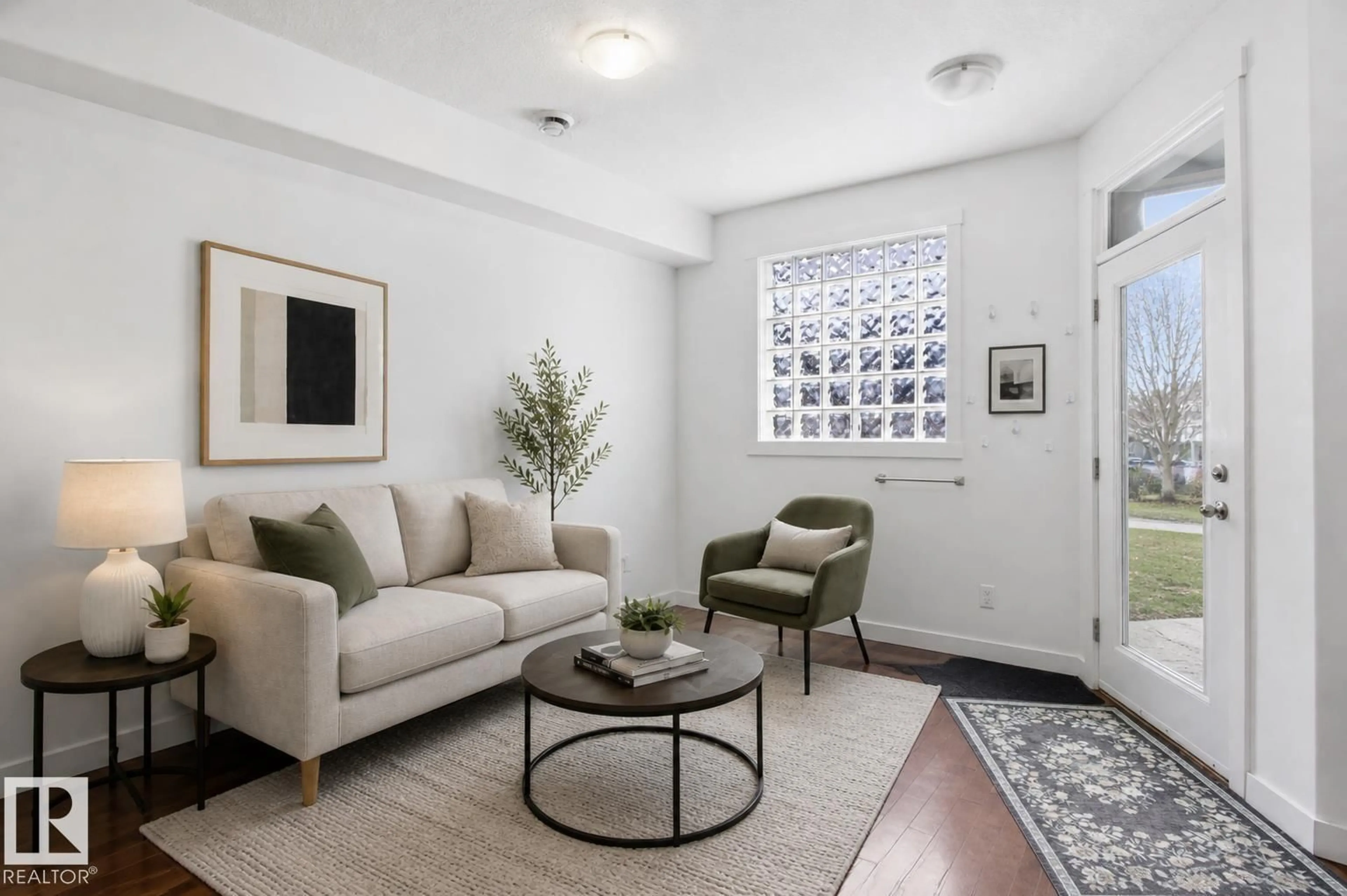 Living room with furniture, unknown for 10806 83 AV, Edmonton Alberta T6E2E7