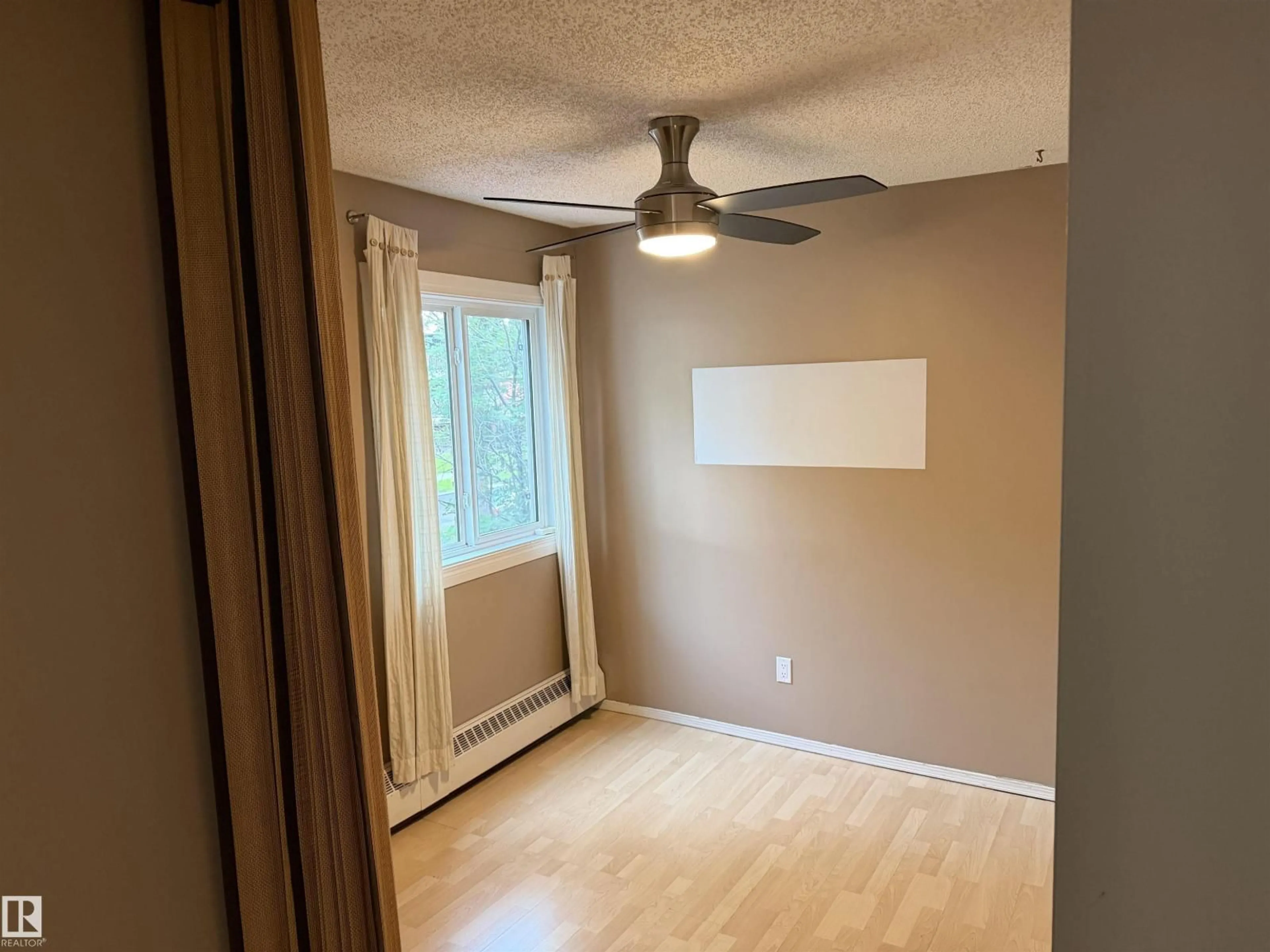 A pic of a room for #203 - 11807 101 ST, Edmonton Alberta T5G2B6