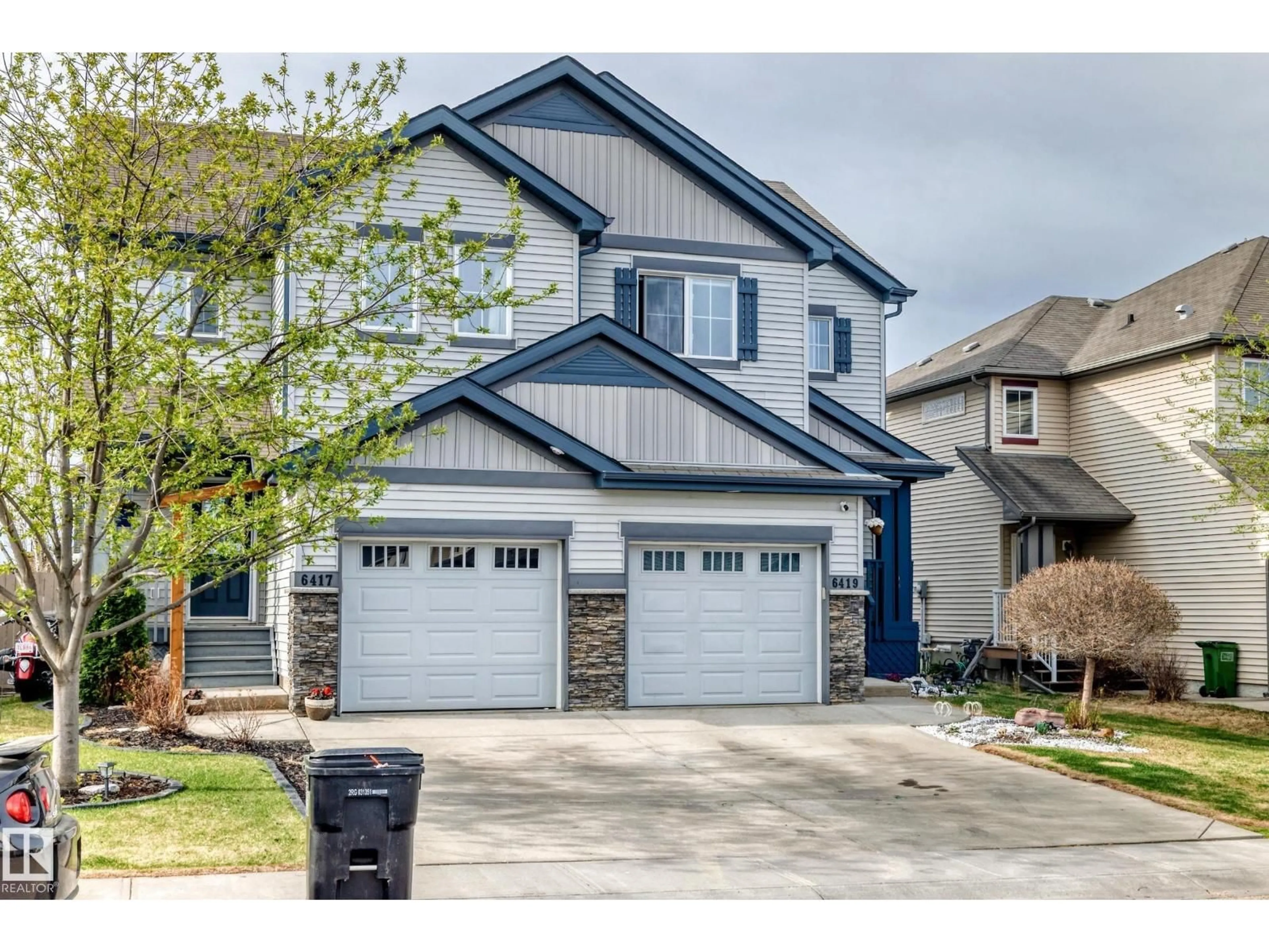 Home with vinyl exterior material, street for SW - 6419 18 AV, Edmonton Alberta T6X0M9
