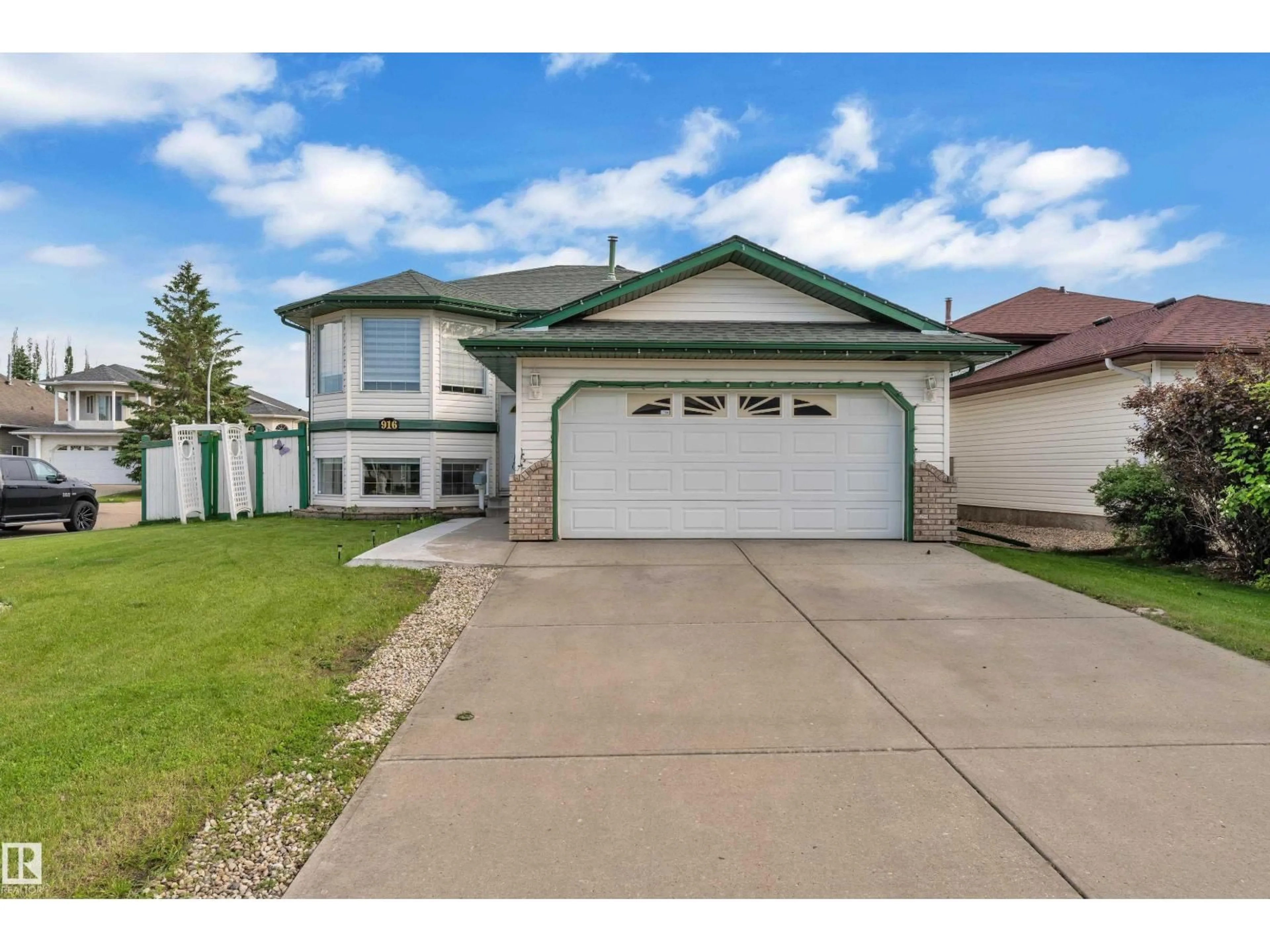 Home with vinyl exterior material, street for 916 JORDAN CR, Edmonton Alberta T6L6X5