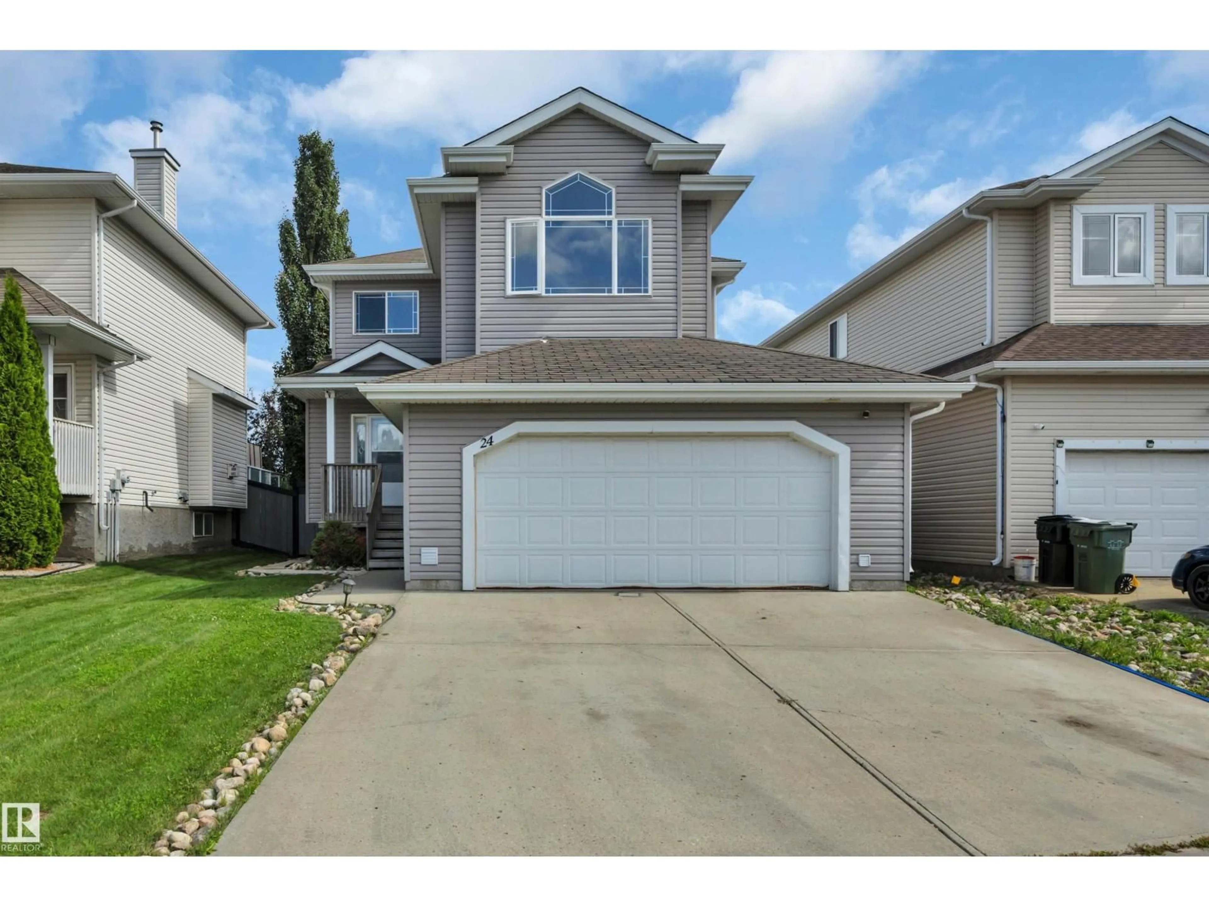Home with vinyl exterior material, street for 24 BIRCHMONT DR, Leduc Alberta T9E8S3