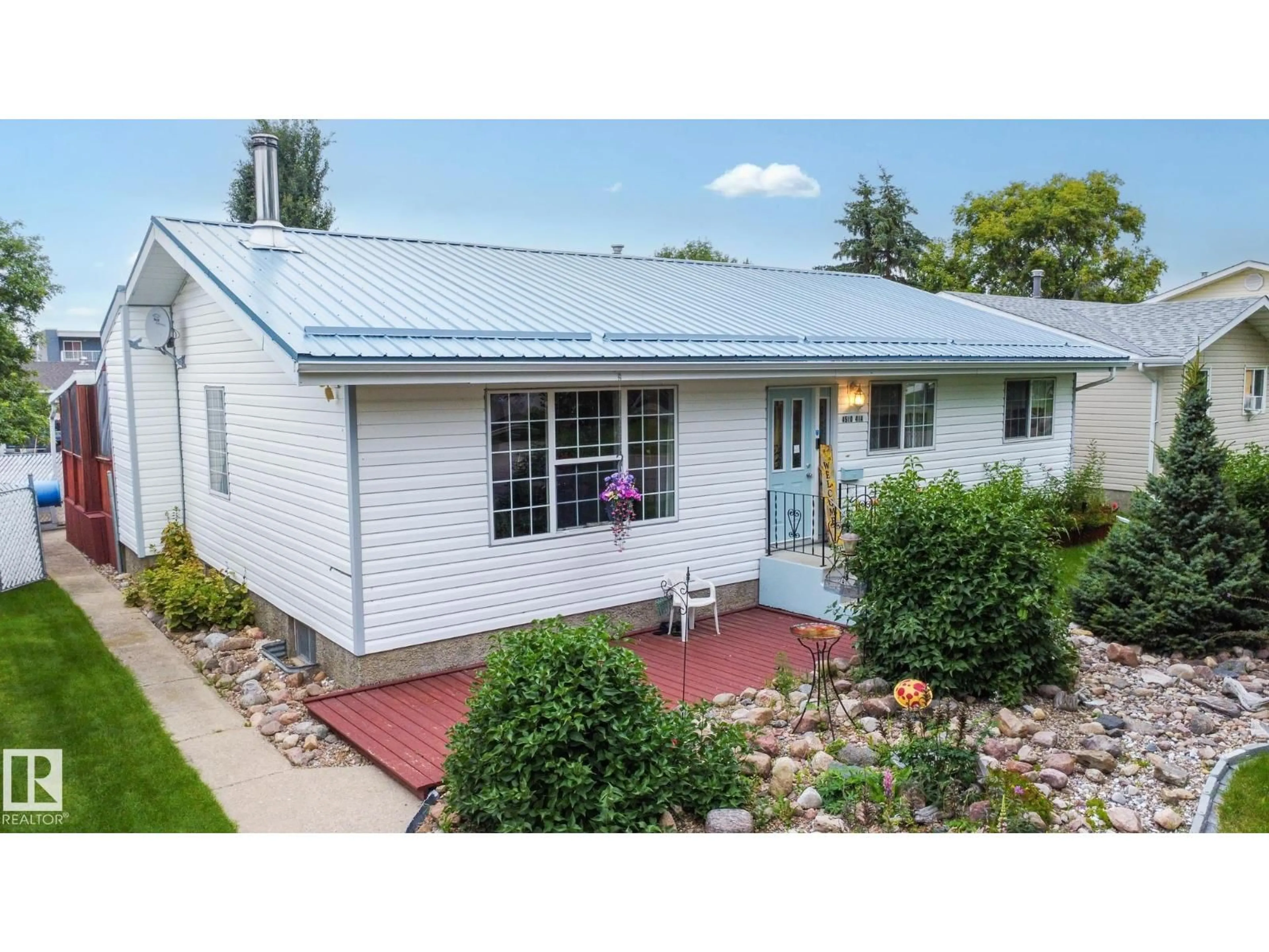 Home with vinyl exterior material, street for 4510 41A ST, Bonnyville Town Alberta T9N1K3