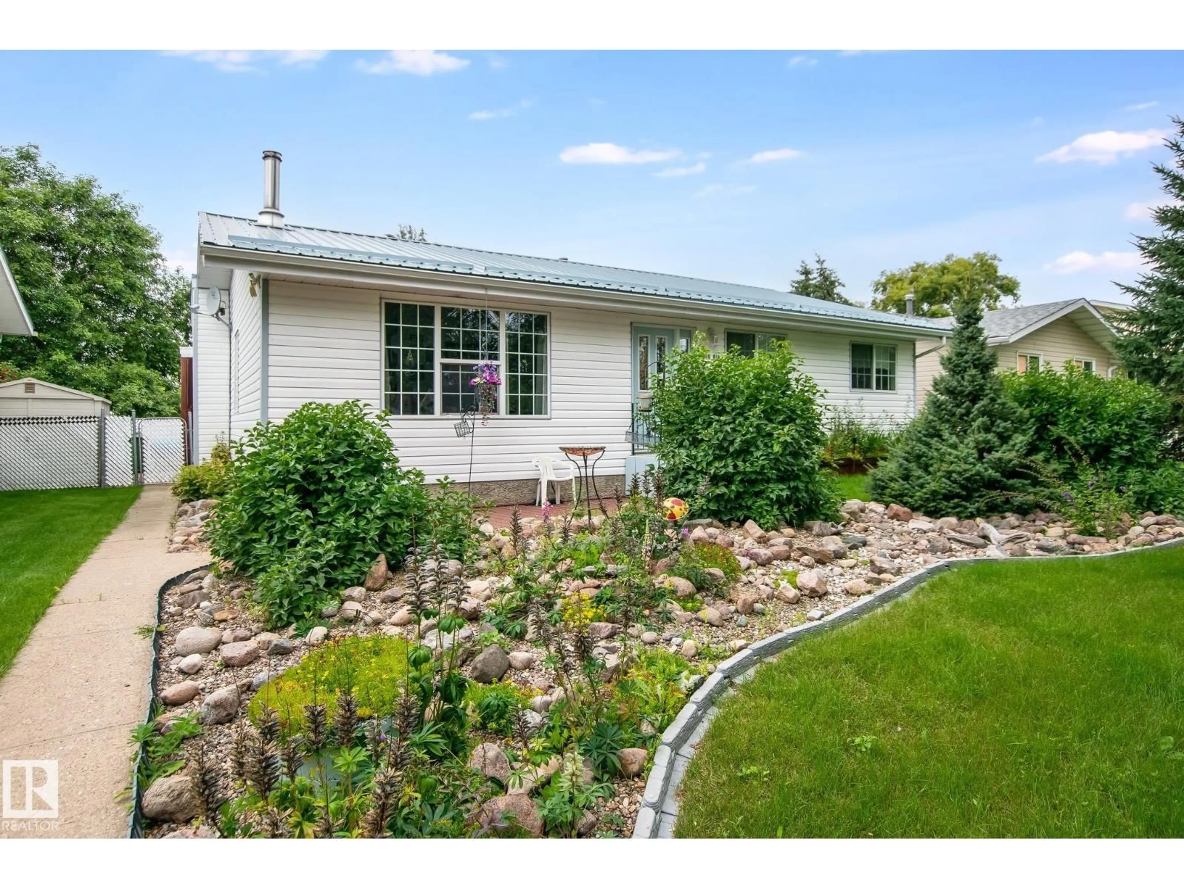 A pic from outside/outdoor area/front of a property/back of a property/a pic from drone, street for 4510 41A ST, Bonnyville Town Alberta T9N1K3