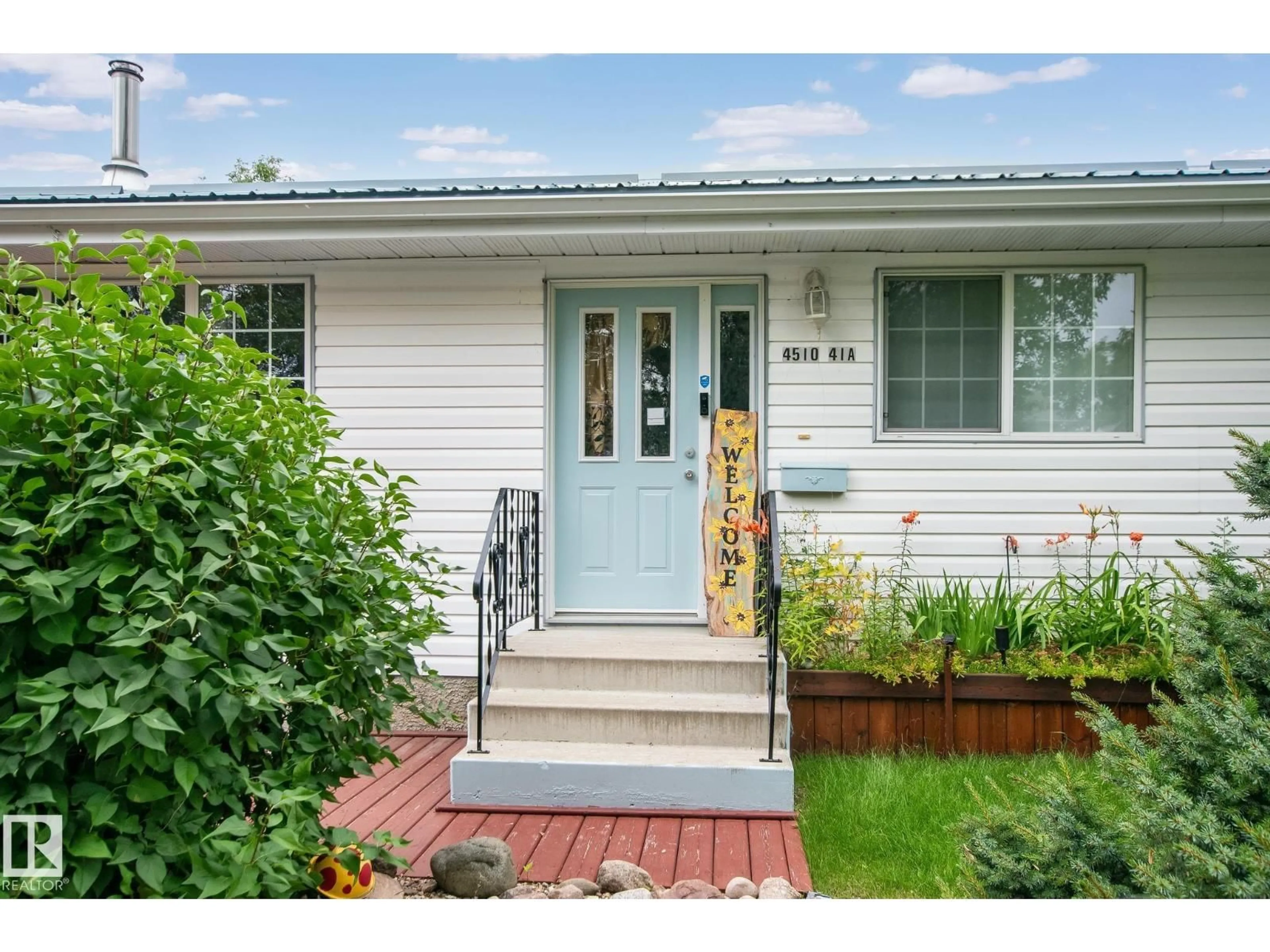 Home with vinyl exterior material, street for 4510 41A ST, Bonnyville Town Alberta T9N1K3