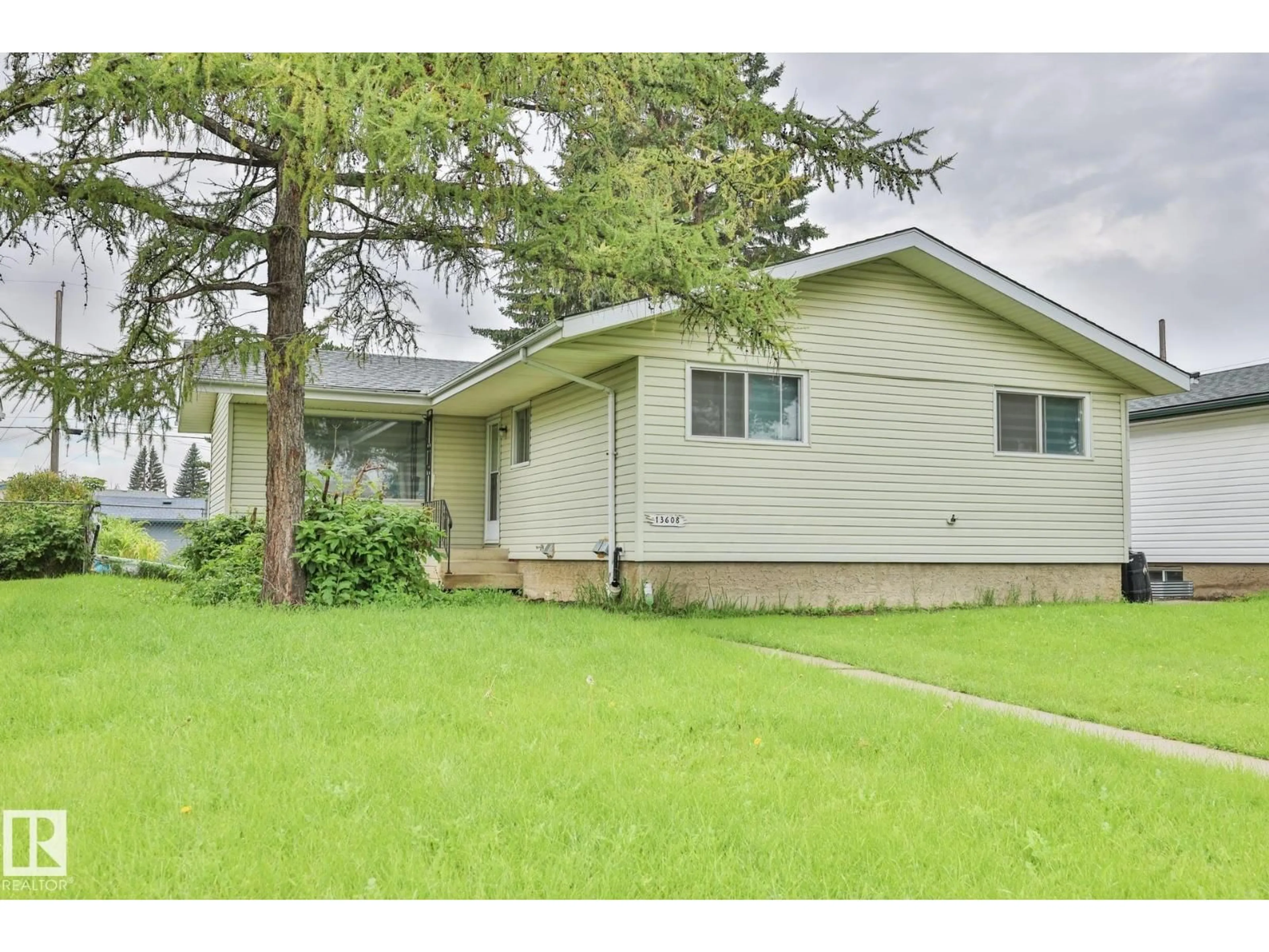 Home with vinyl exterior material, street for NW - 13608 114 ST, Edmonton Alberta T5E5E6