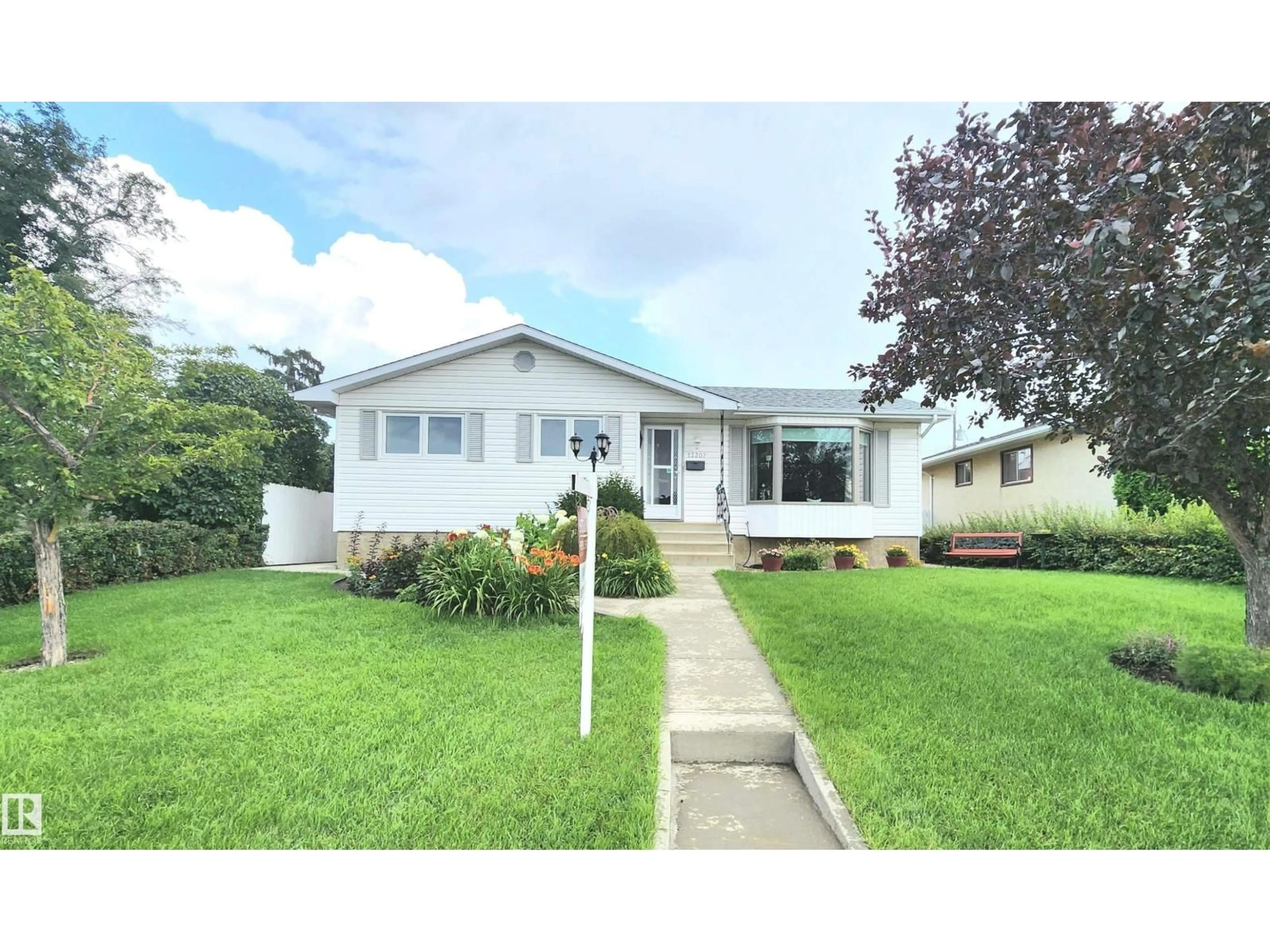 Home with vinyl exterior material, street for 13307 DELWOOD RD, Edmonton Alberta T5C3B5