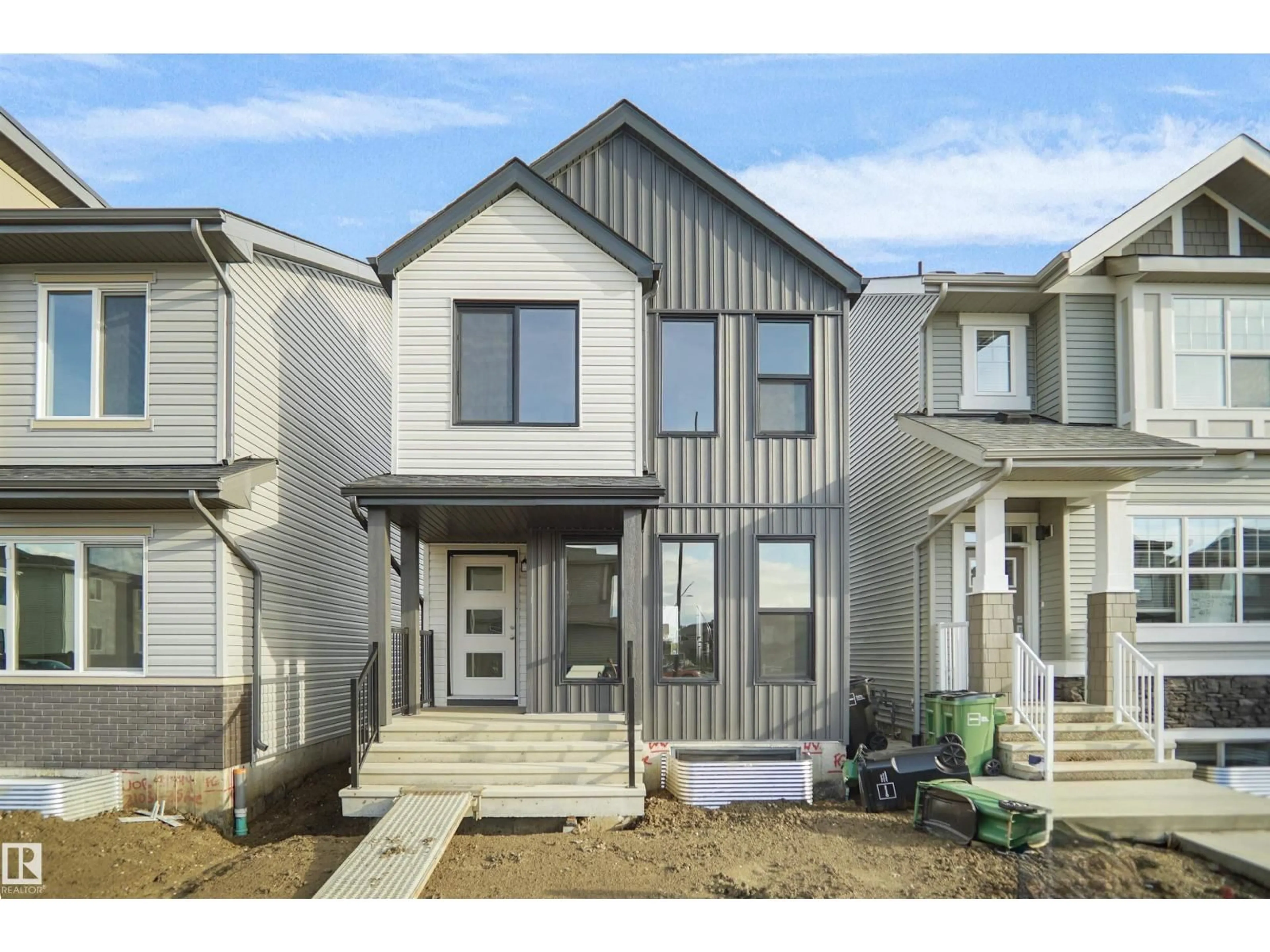 Home with vinyl exterior material, street for 37 LEAWOOD LI, Spruce Grove Alberta T7X4V1