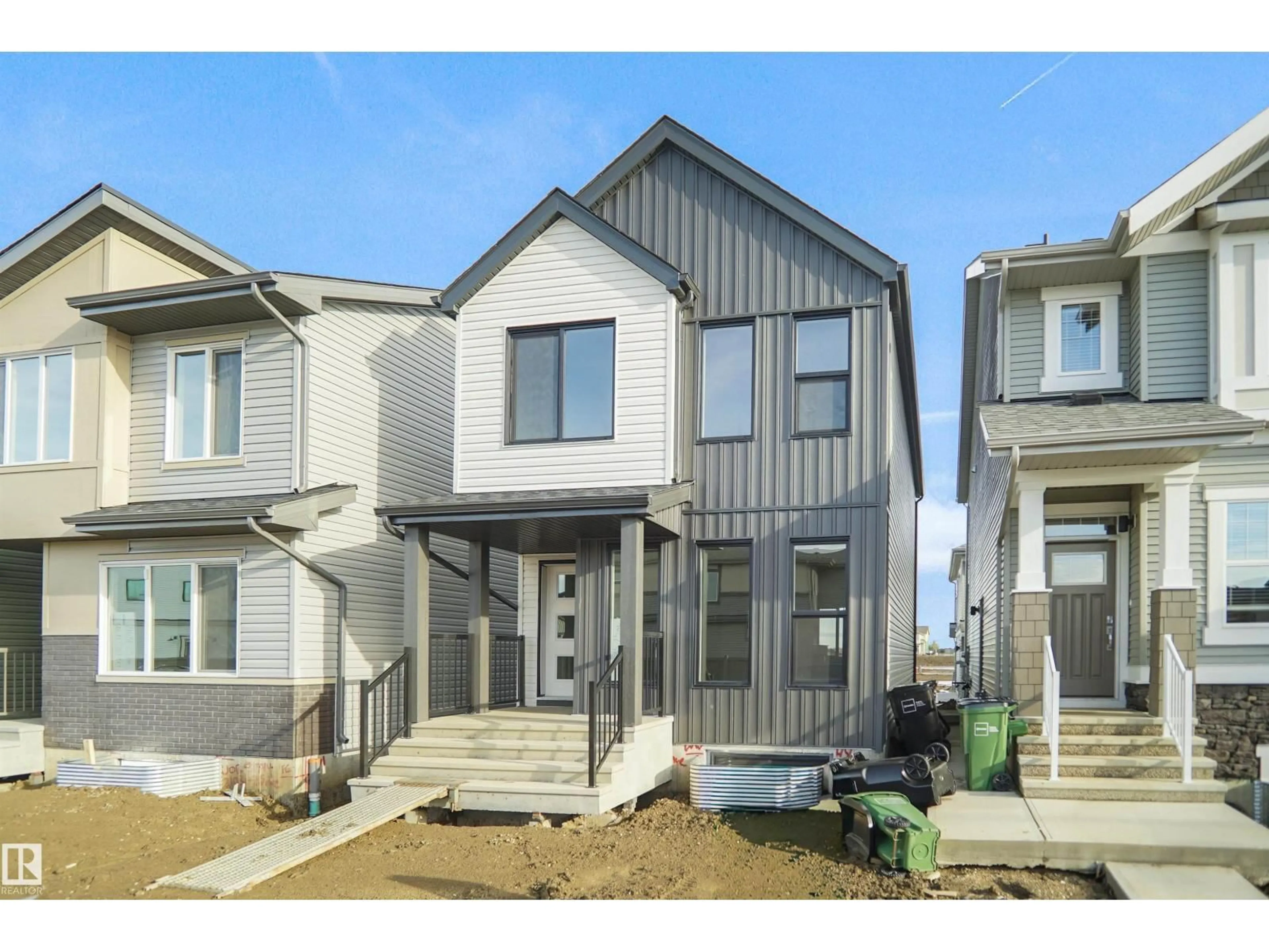 Home with vinyl exterior material, street for 37 LEAWOOD LI, Spruce Grove Alberta T7X4V1
