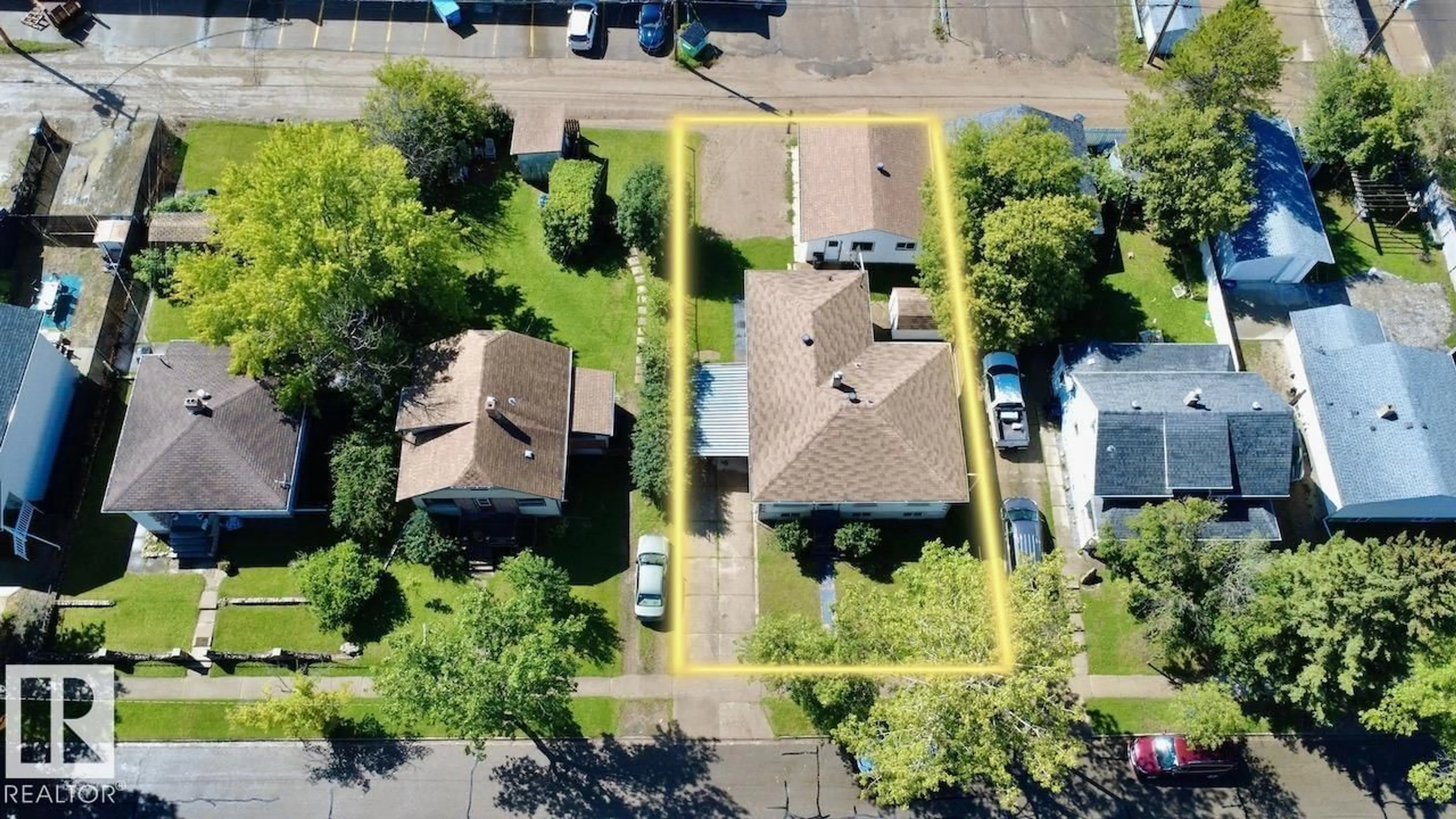 A pic from outside/outdoor area/front of a property/back of a property/a pic from drone, street for 5044 49 ST, Drayton Valley Alberta T7A1C9