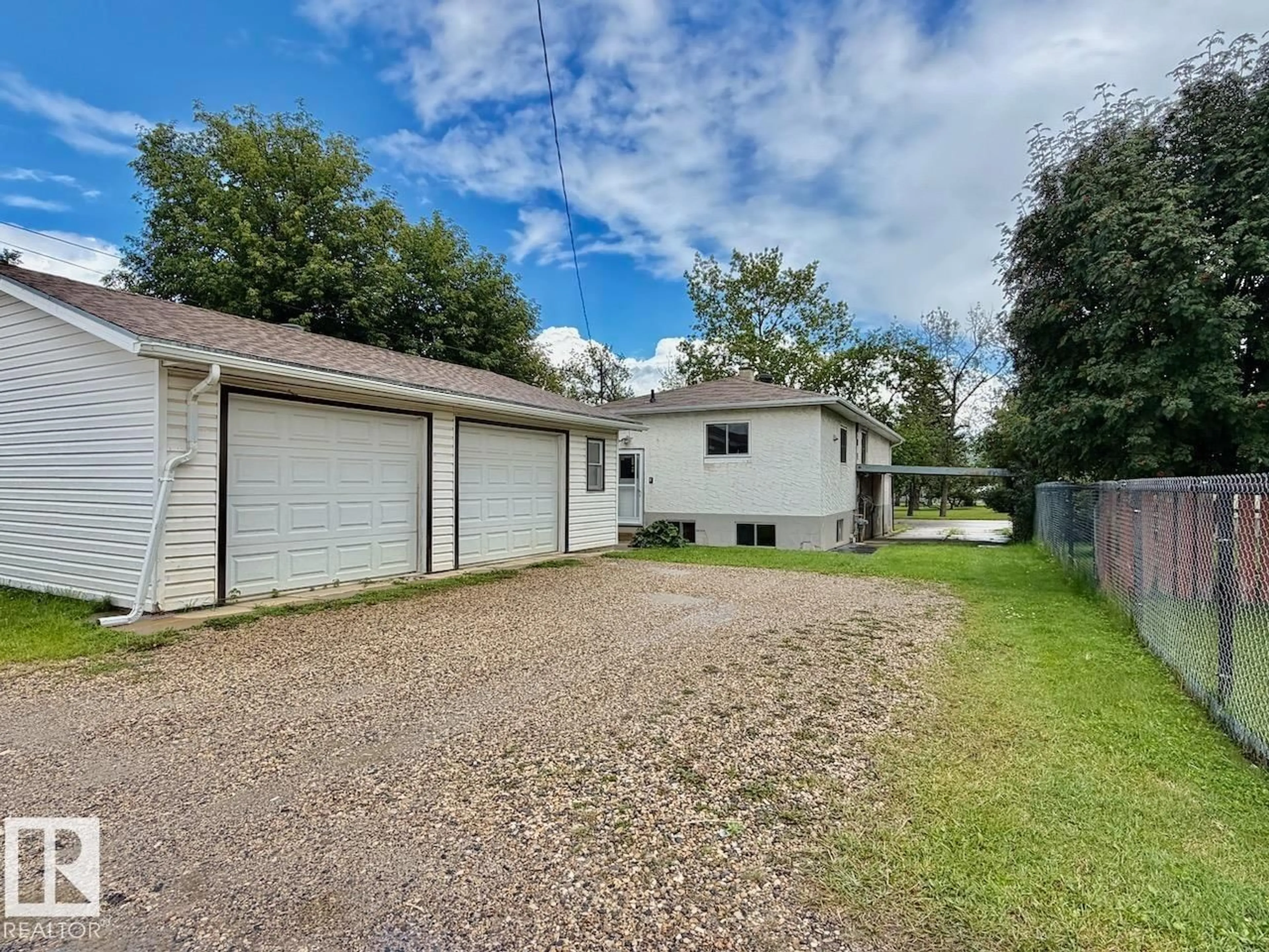 A pic from outside/outdoor area/front of a property/back of a property/a pic from drone, street for 5044 49 ST, Drayton Valley Alberta T7A1C9