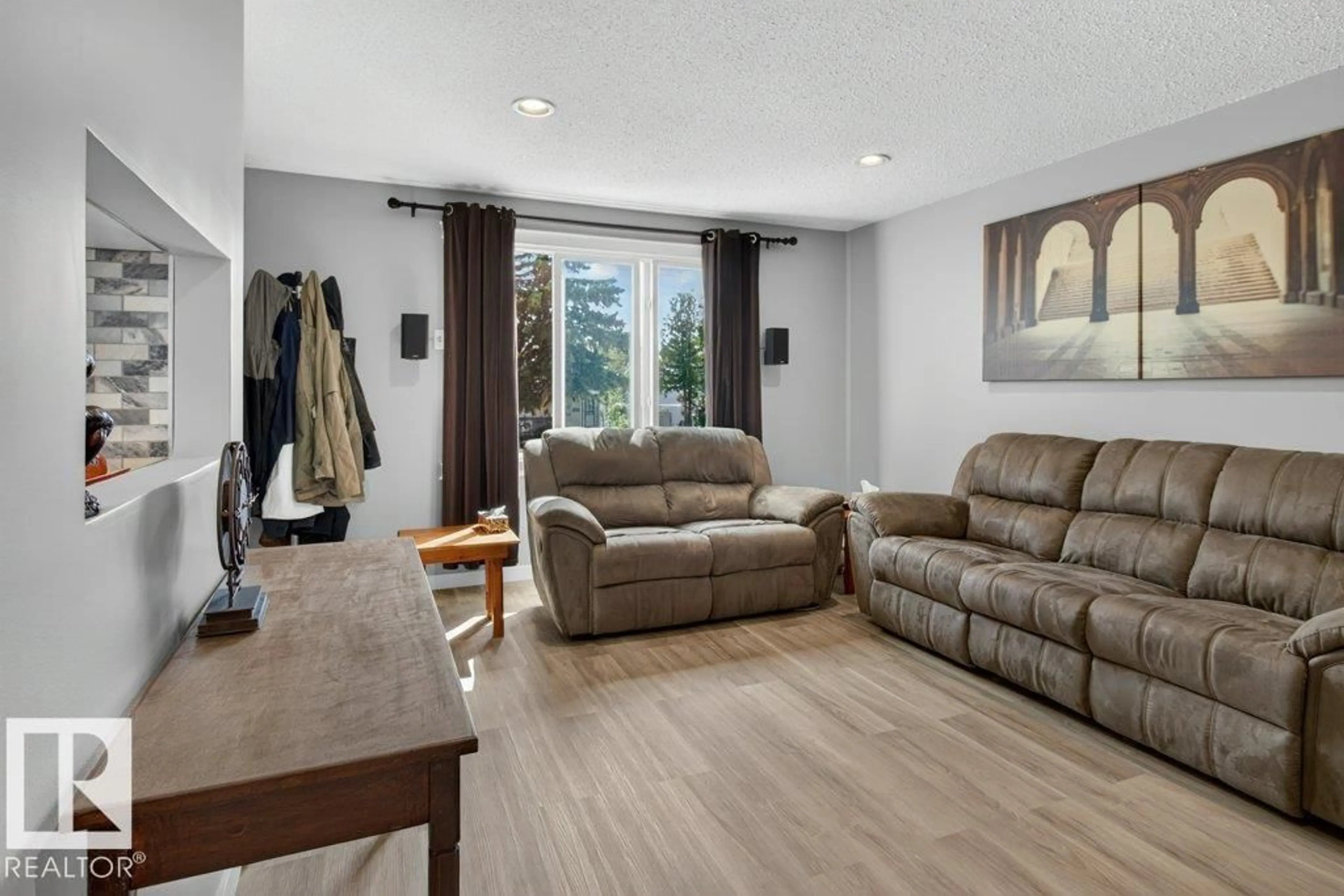 Living room with furniture, unknown for 4624 36 AV, Edmonton Alberta T6L3S3