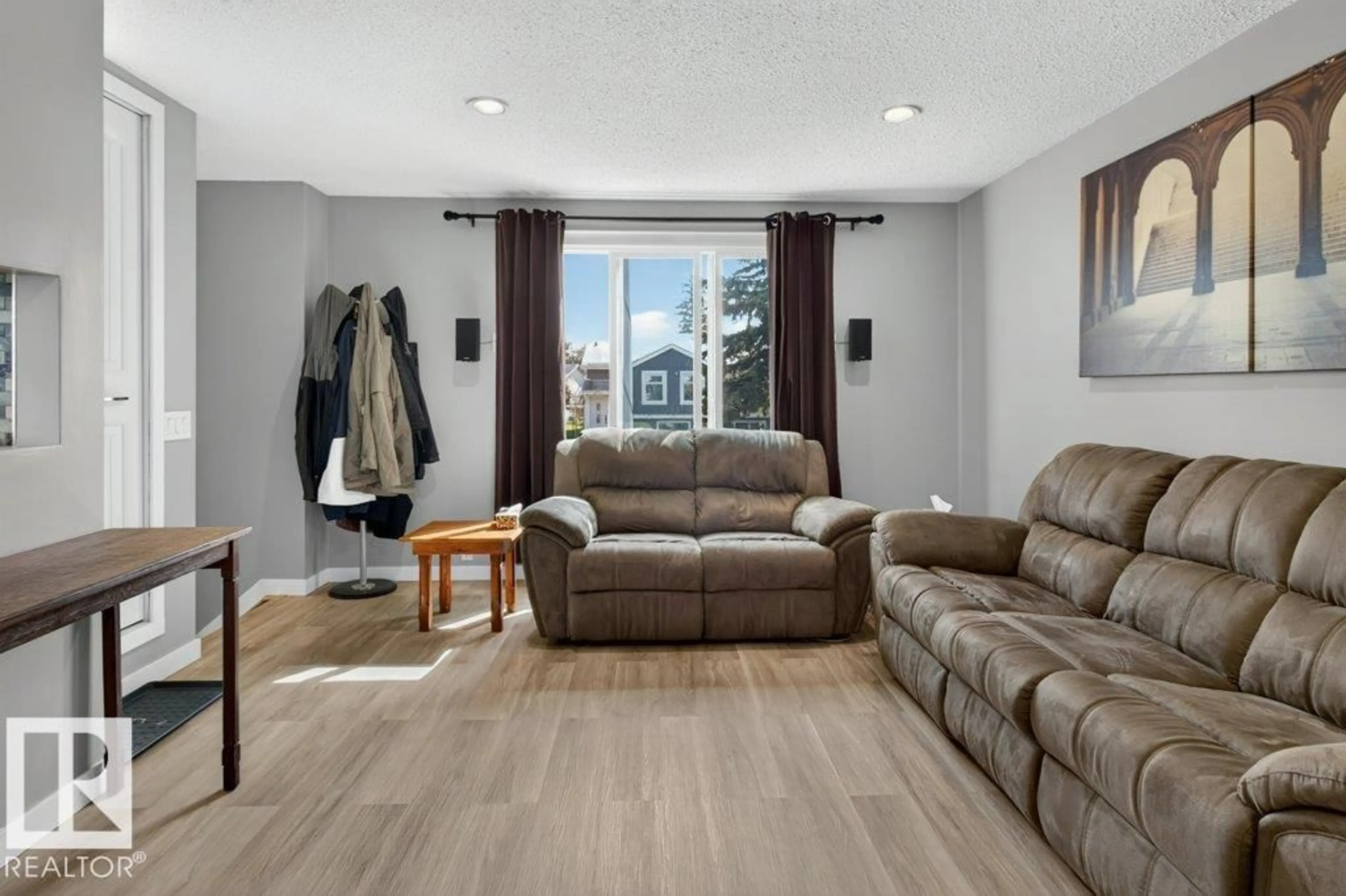 Living room with furniture, unknown for 4624 36 AV, Edmonton Alberta T6L3S3