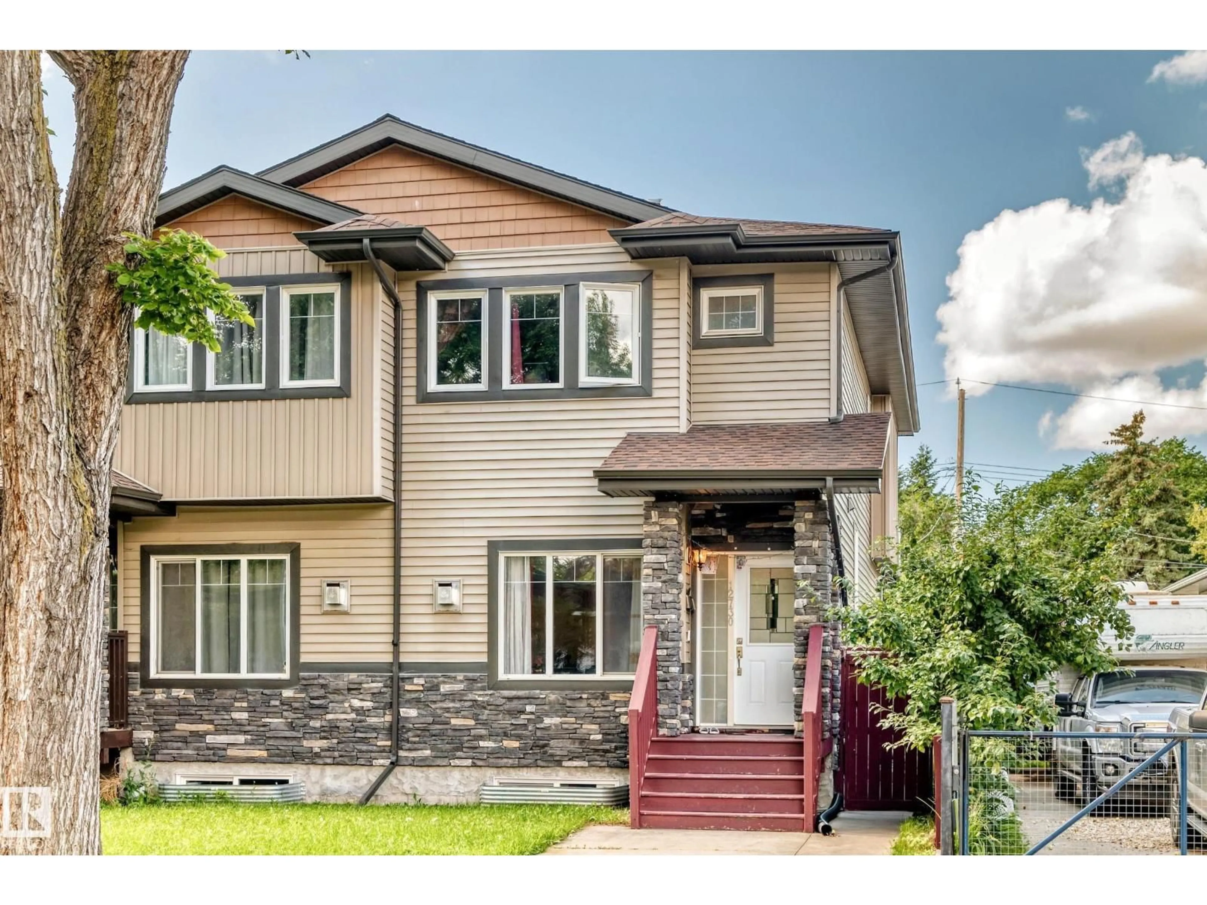 Home with vinyl exterior material, street for NW - 12730 118 ST, Edmonton Alberta T5E5K8