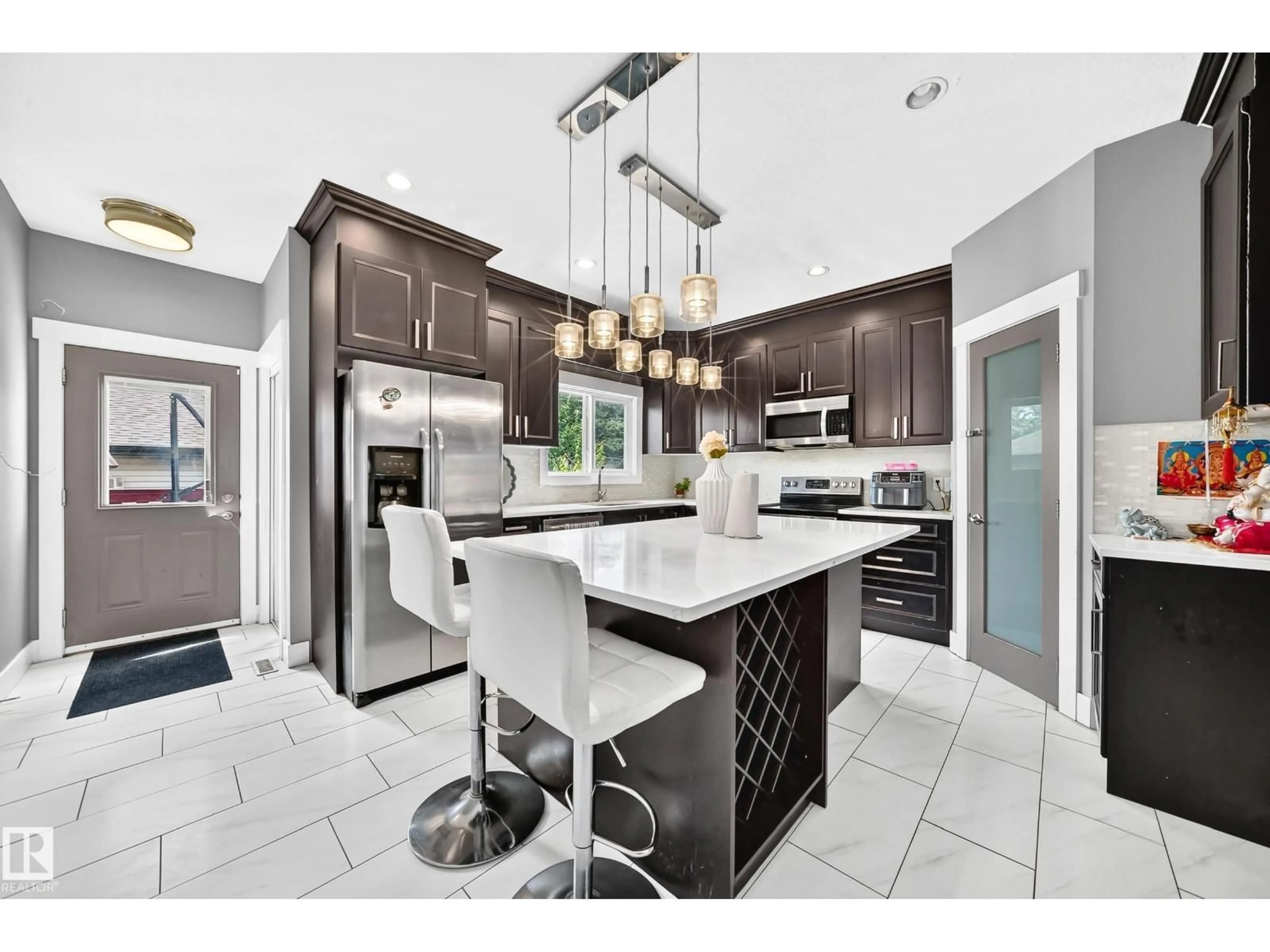 Open concept kitchen, ceramic/tile floor for NW - 12730 118 ST, Edmonton Alberta T5E5K8