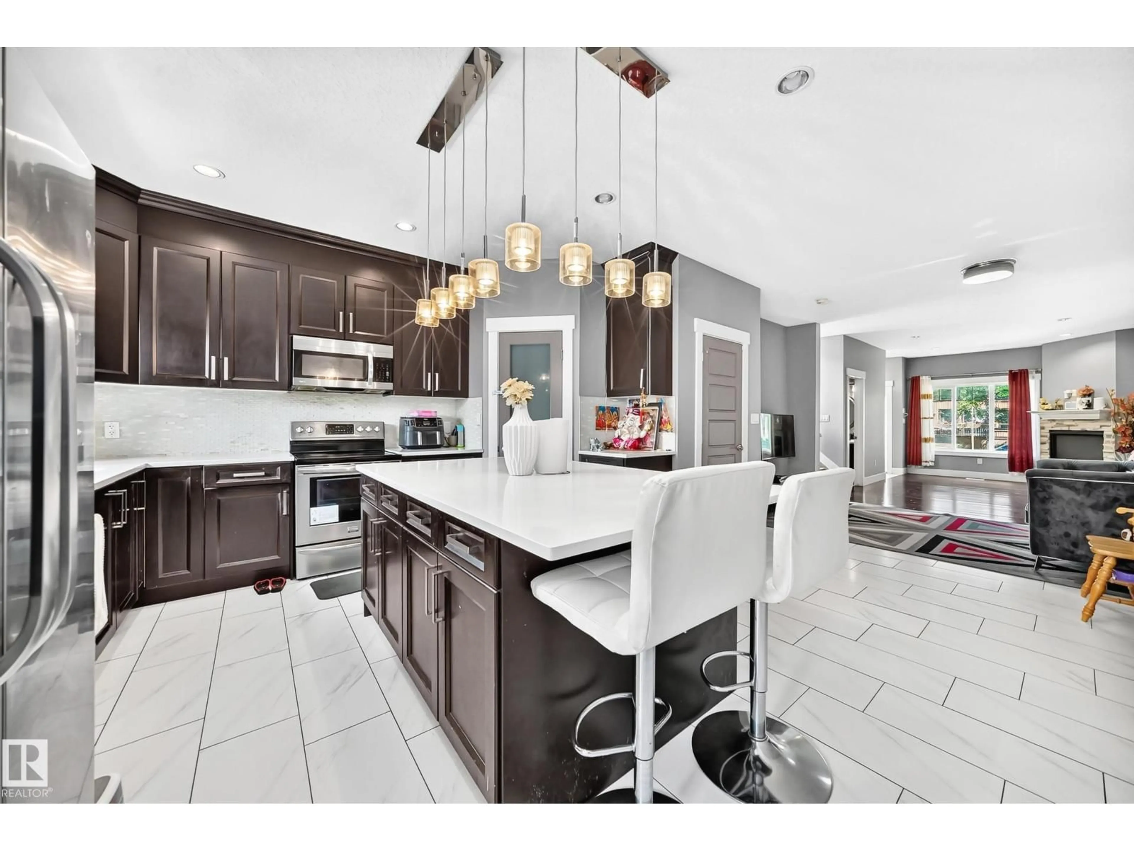 Open concept kitchen, ceramic/tile floor for NW - 12730 118 ST, Edmonton Alberta T5E5K8