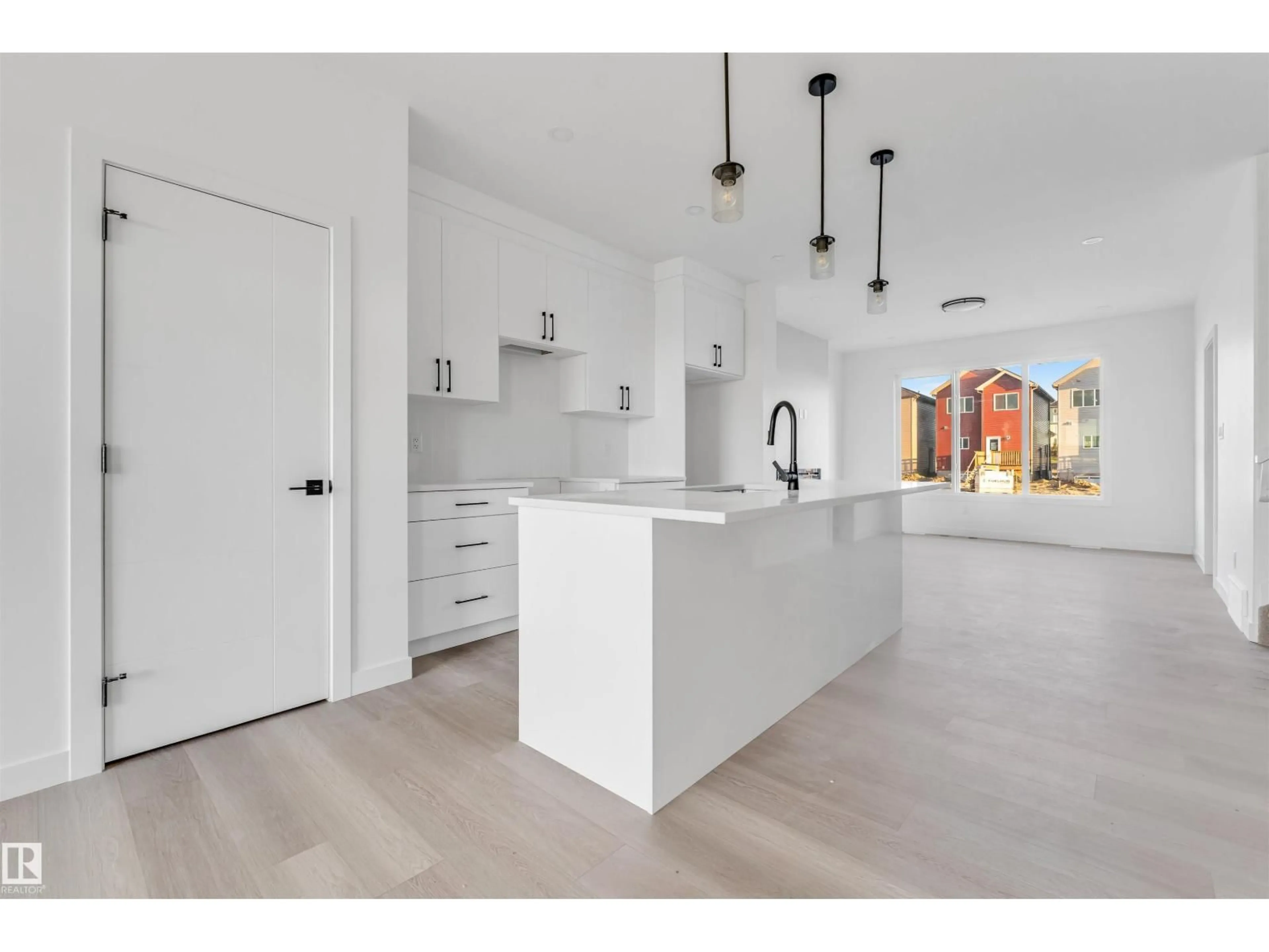Open concept kitchen, ceramic/tile floor for 554 ASHGROVE CIRCLE, Leduc Alberta T9E0K8