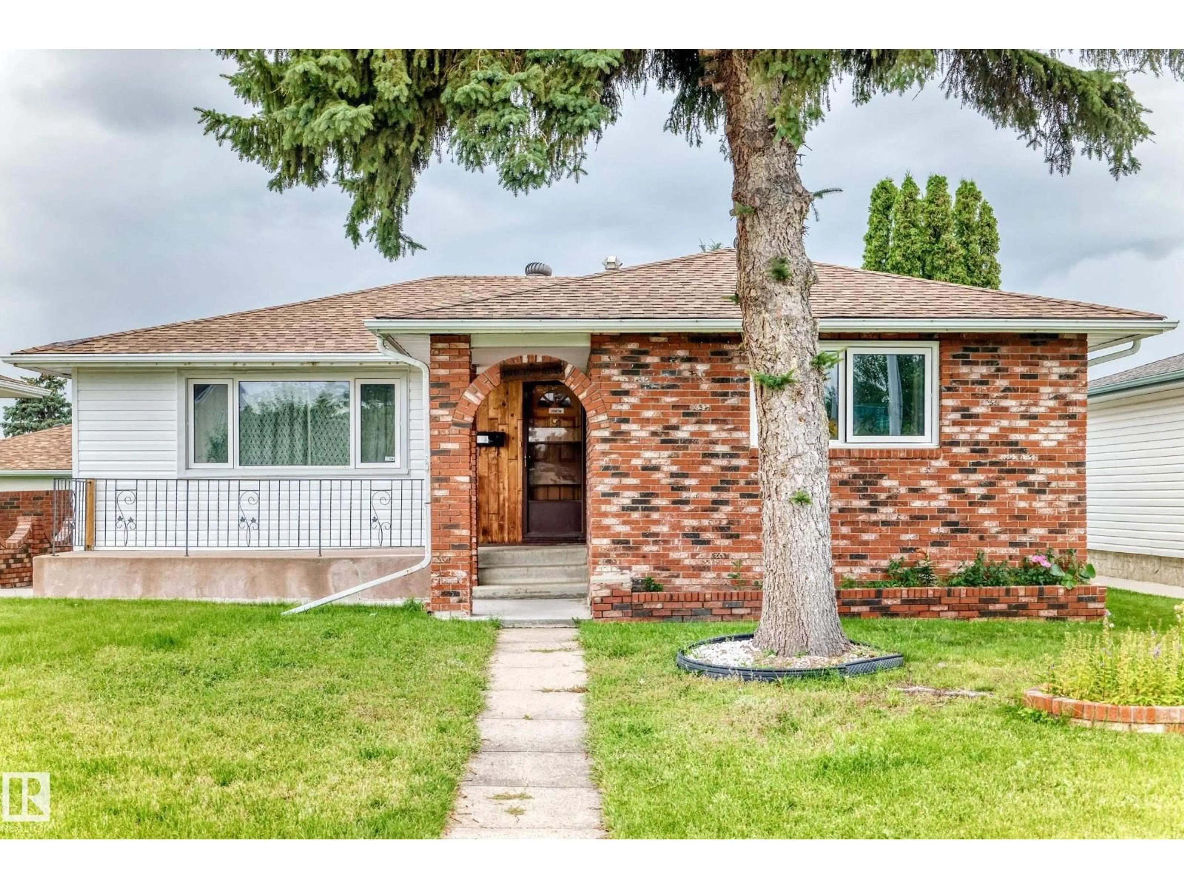 Home with brick exterior material, street for NW - 15020 88 ST, Edmonton Alberta T5E5T5