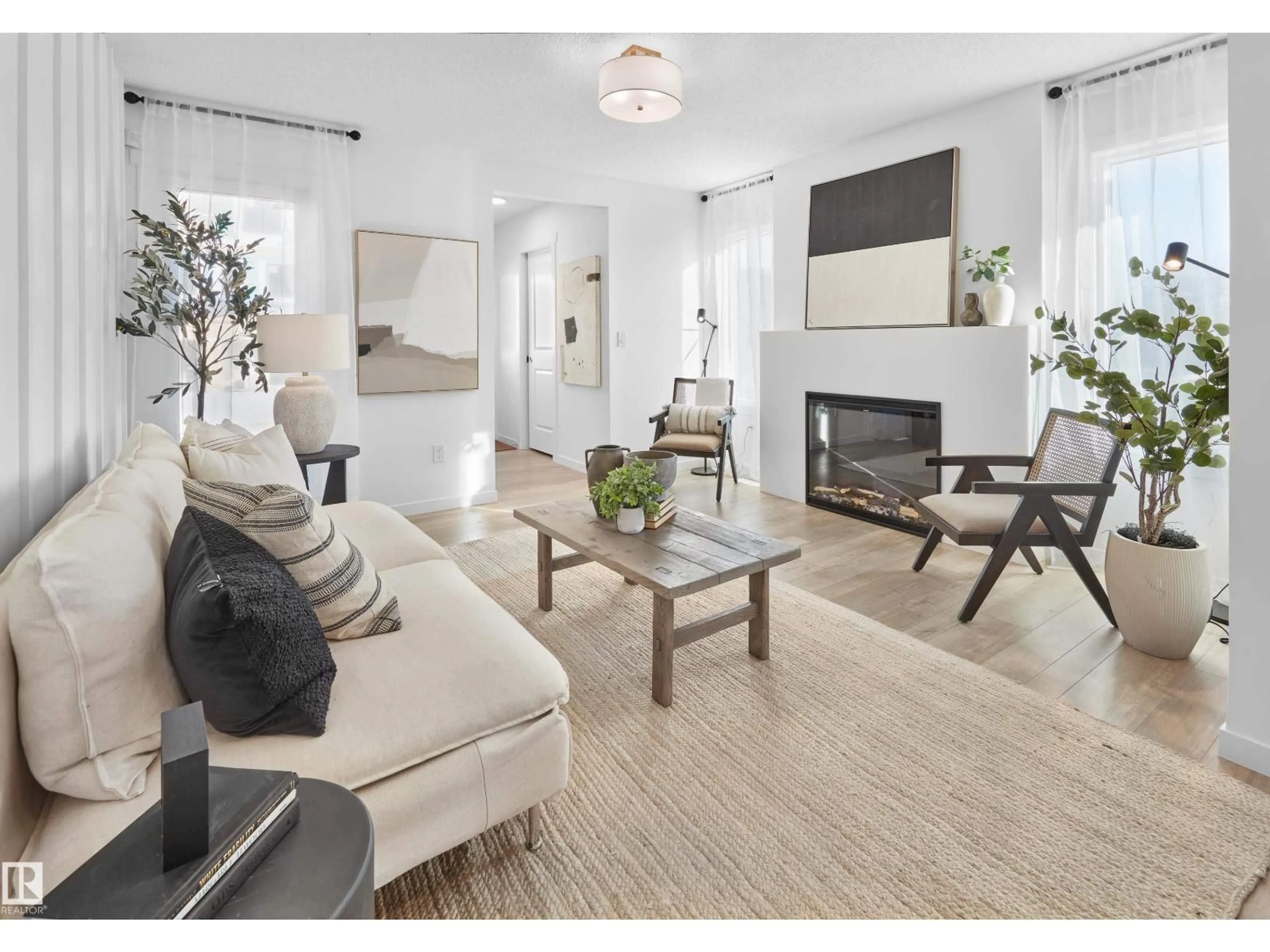 Living room with furniture, unknown for 648 UPLANDS DR, Edmonton Alberta T6M3L9