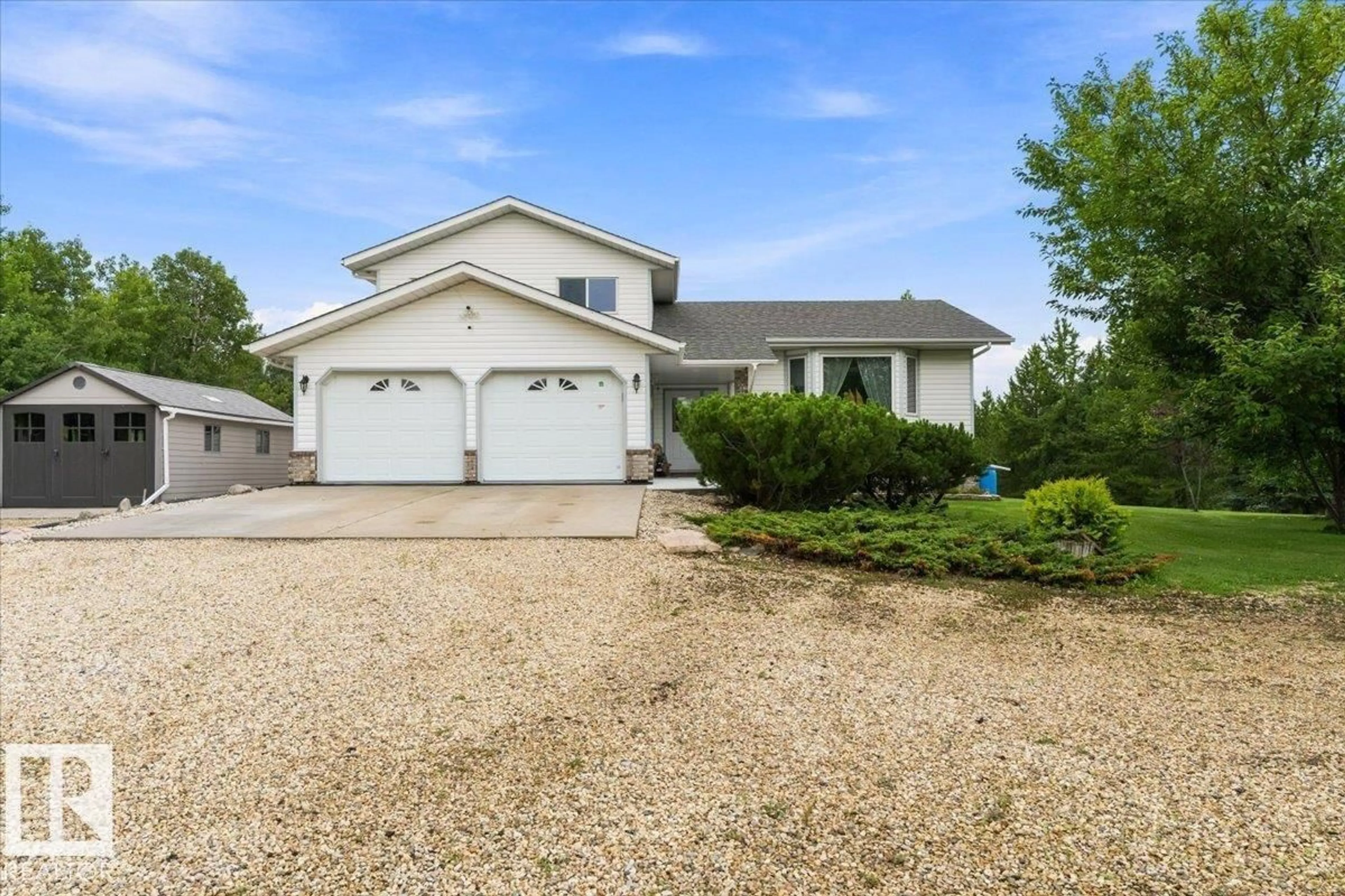 Home with vinyl exterior material, street for 85 20212 TWP ROAD ROAD, Rural Strathcona County Alberta T8G1E4