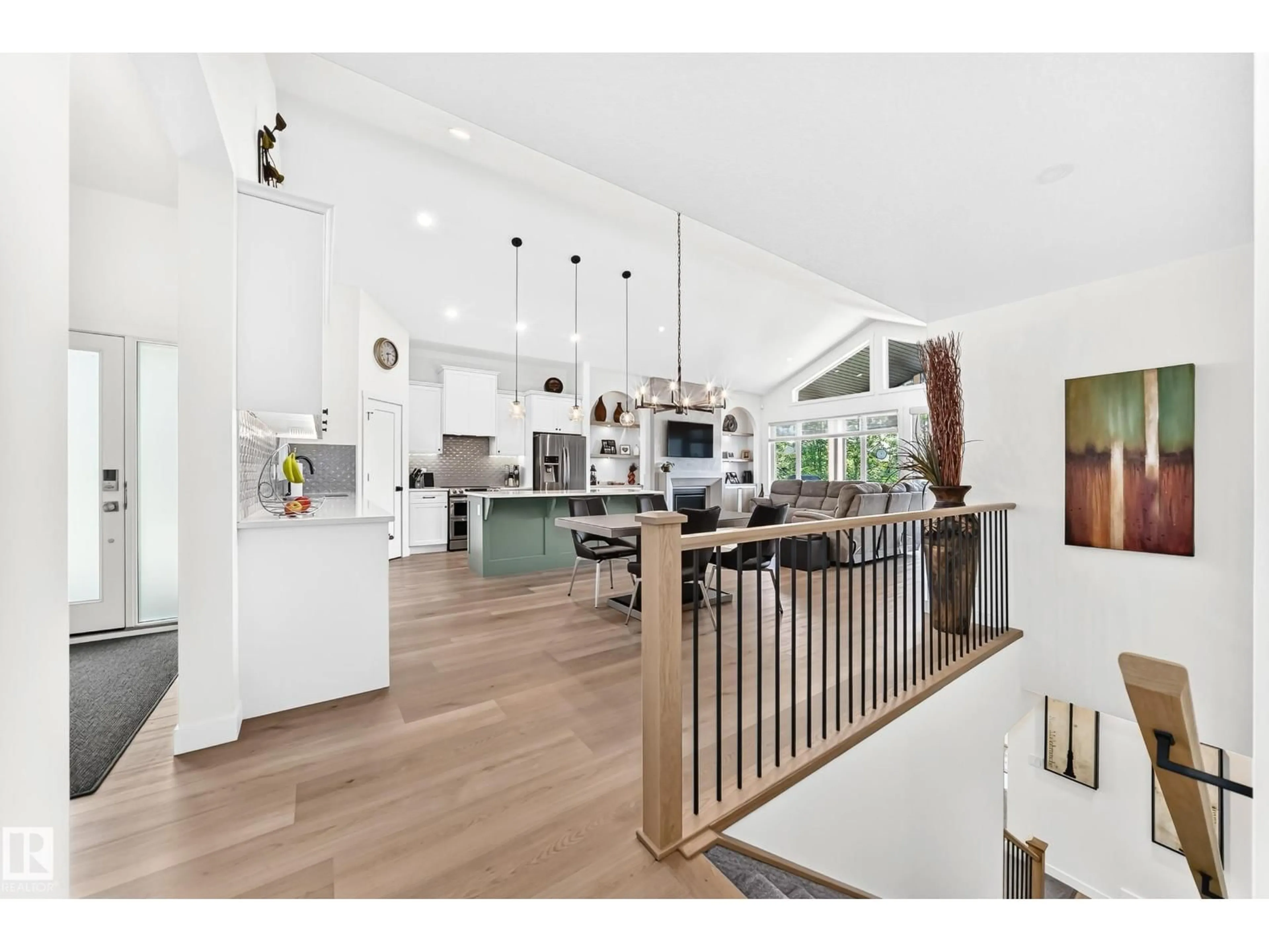 Open concept kitchen, wood/laminate floor for 202 55101 STE ANNE TRAIL, Rural Lac Ste. Anne County Alberta T0E1A1
