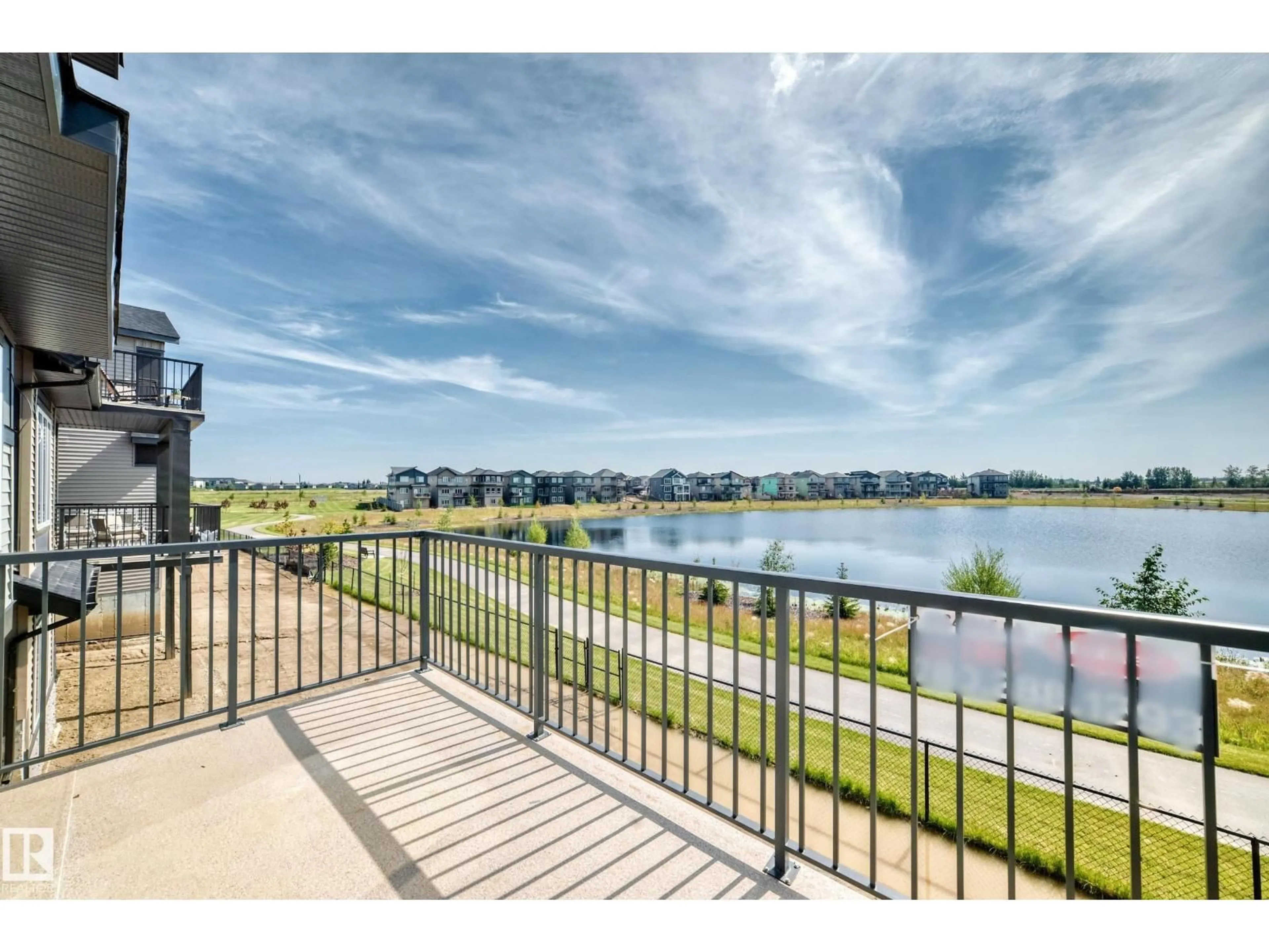 A pic from outside/outdoor area/front of a property/back of a property/a pic from drone, water/lake/river/ocean view for 449 CRYSTAL CREEK LINK, Leduc Alberta T9E0X5